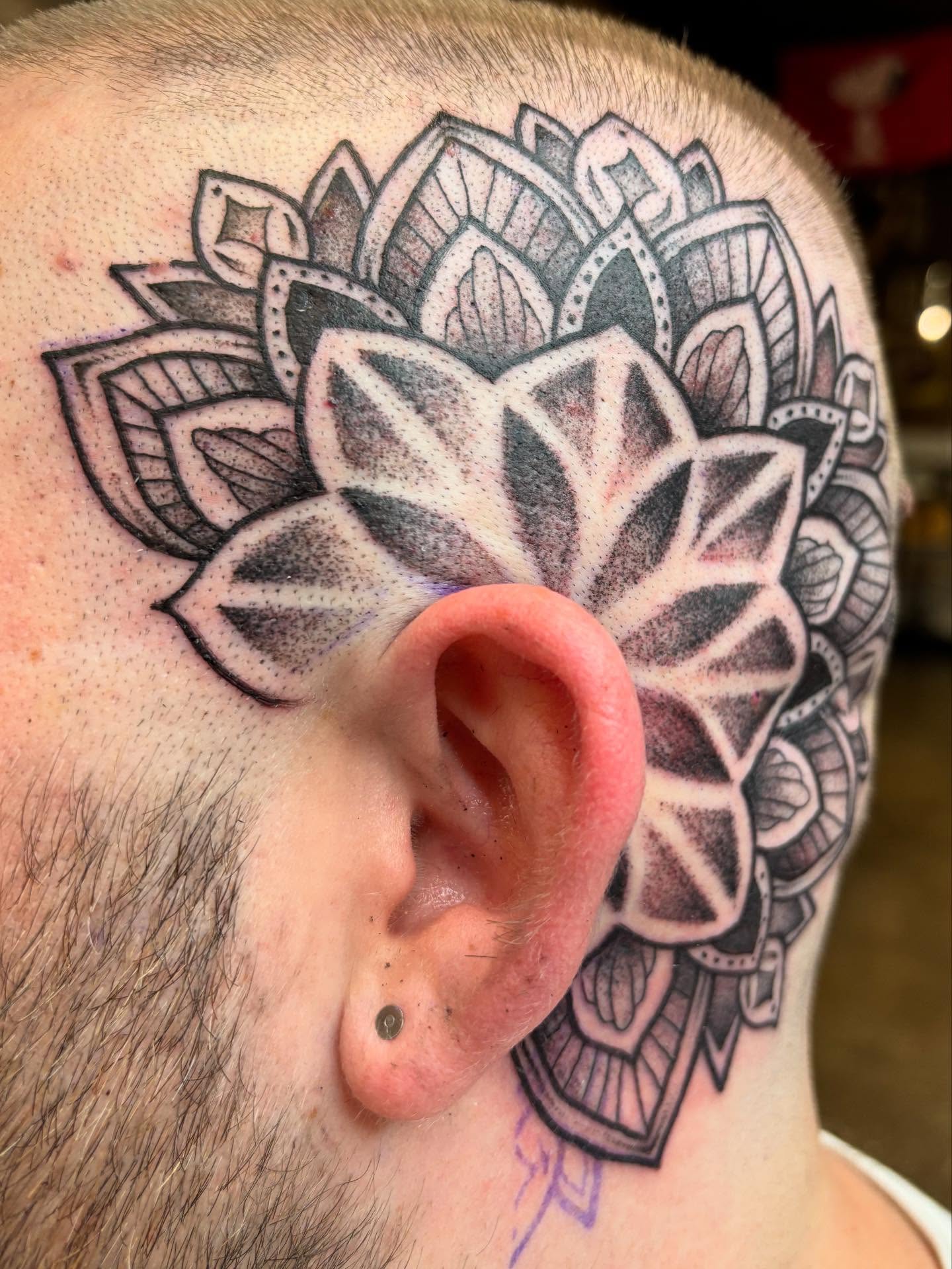 Lotus flower dotwork tattoo on the head by Brandi ⛓, Detroit, Michigan