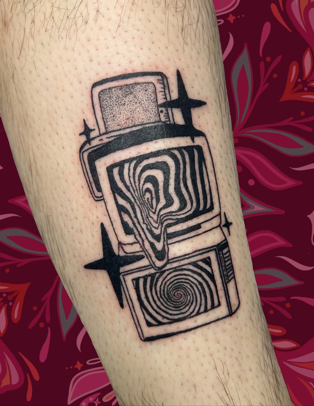 Melting television with hypnotic screens surrealism tattoo on the forearm by ❆ minneapolis tattoo artist ❆
