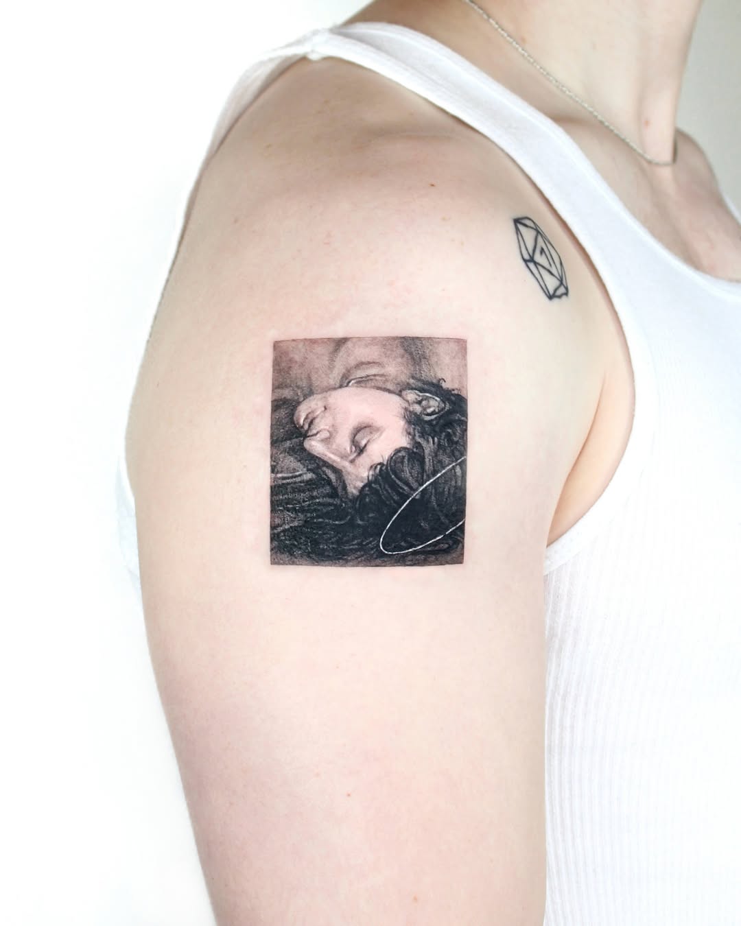 Tattoo by @tatmostat — realism, black_and_grey