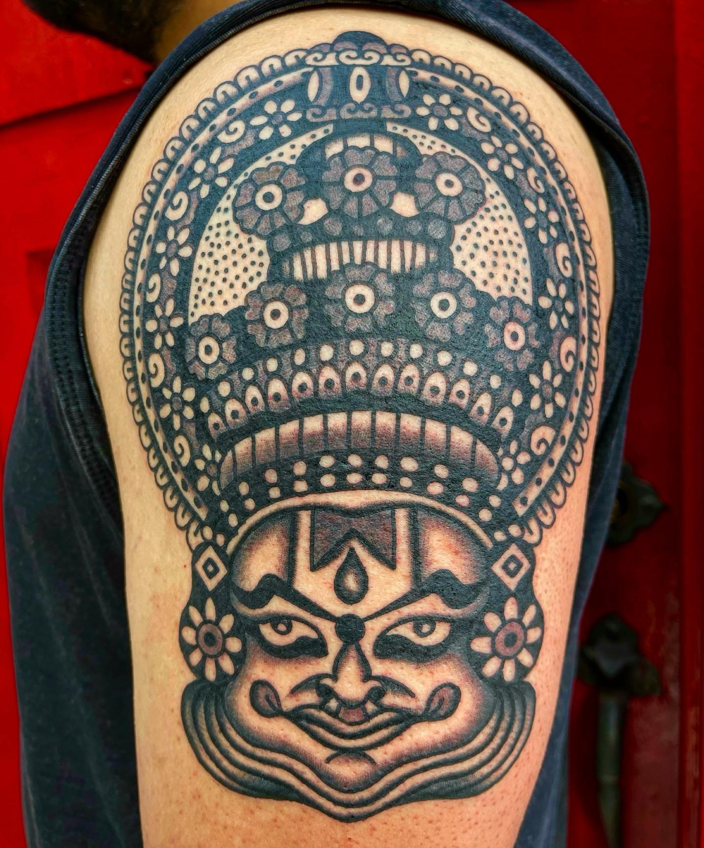 Masks black and grey tattoo on the forearm by Swasthik Iyengar, New York, New York