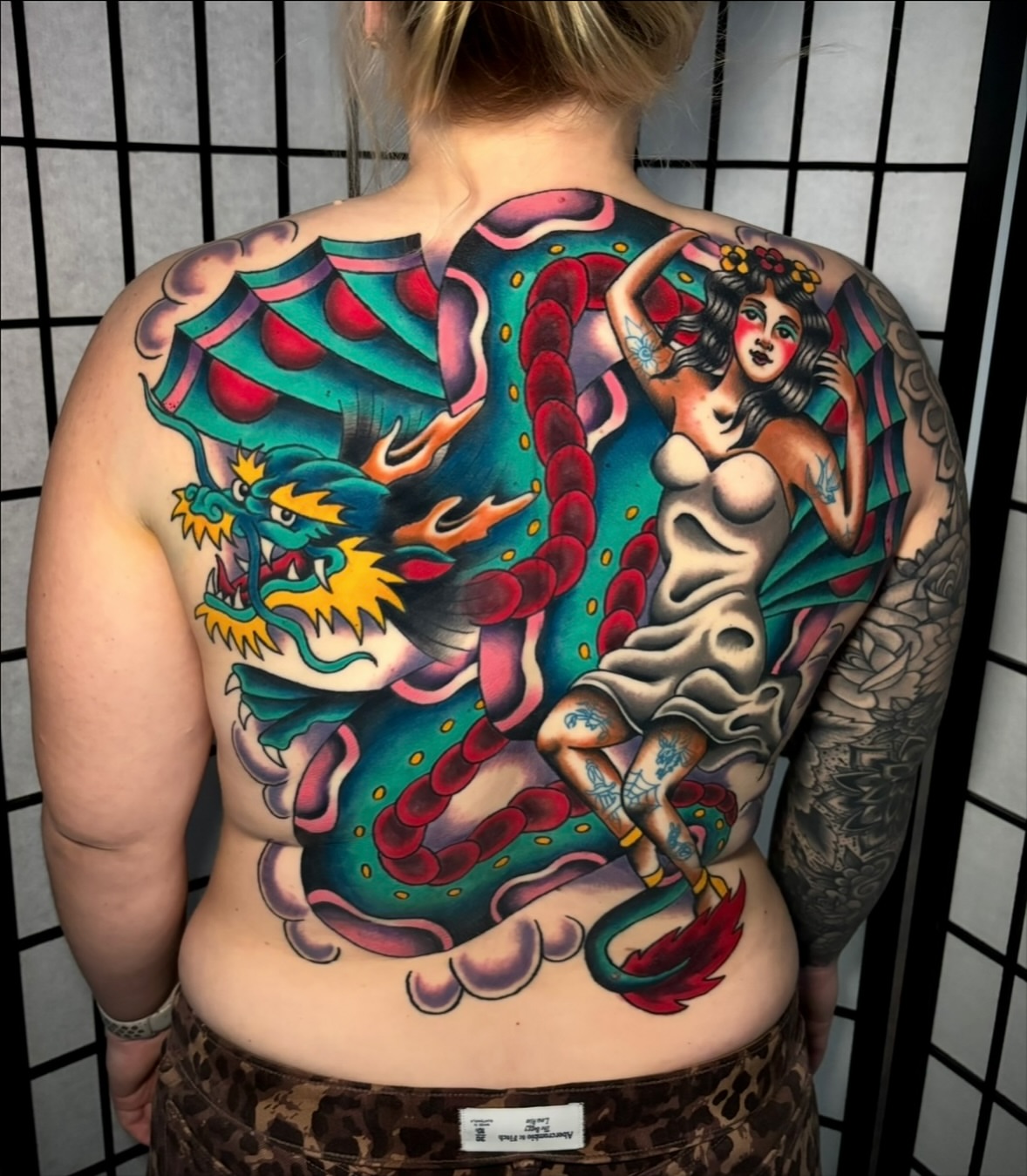 Dragon and woman American traditional tattoo on the back by Mickey Putillo, Charlotte, North Carolina
