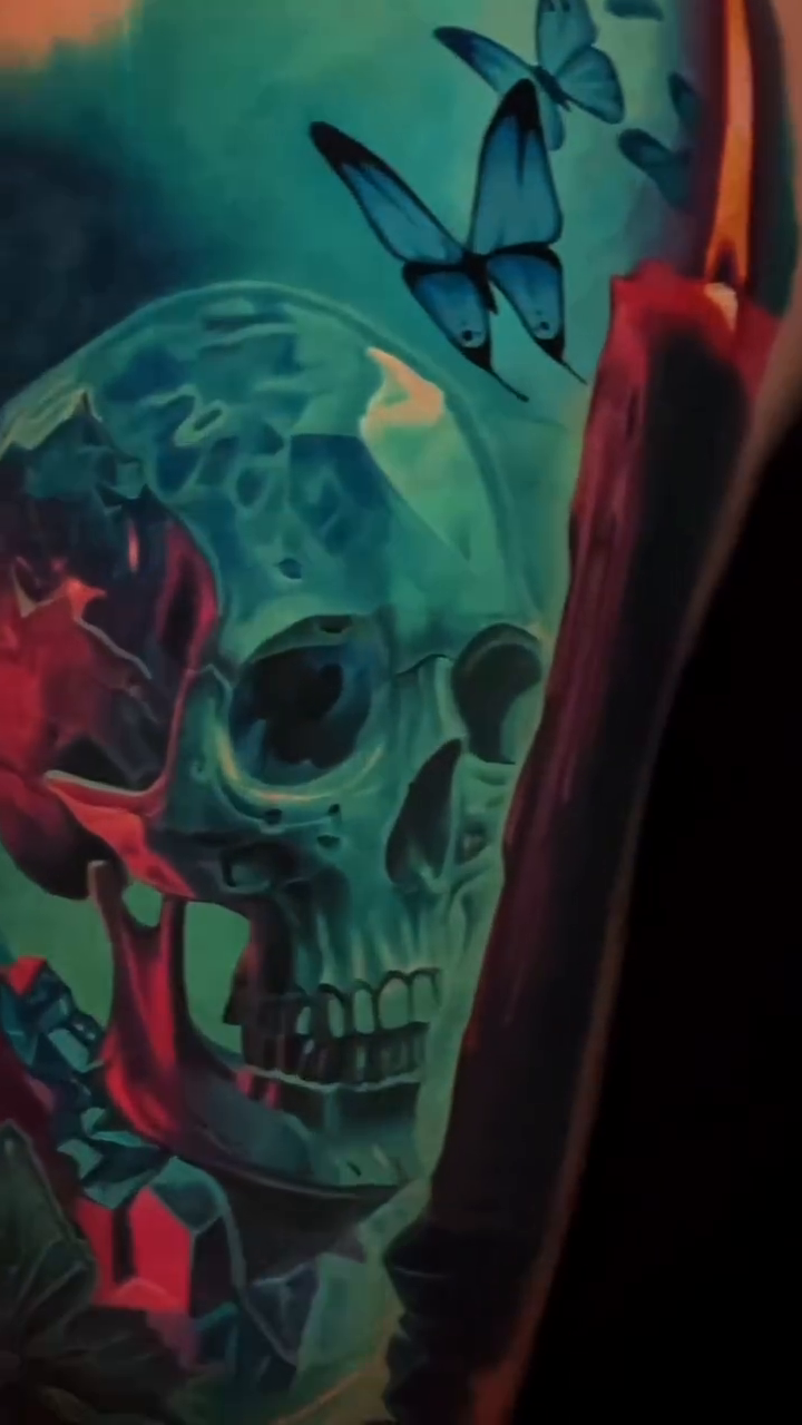 Skull and candle with butterflies realism tattoo by Sean Foy