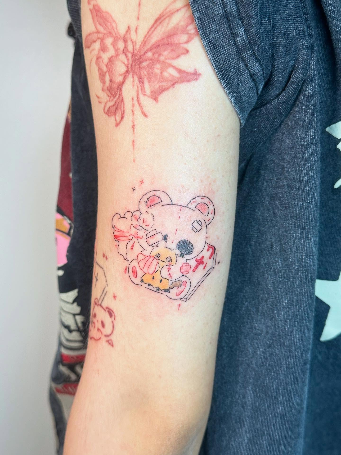 Kitty and teddy bear dotwork tattoo on the forearm by Tomato