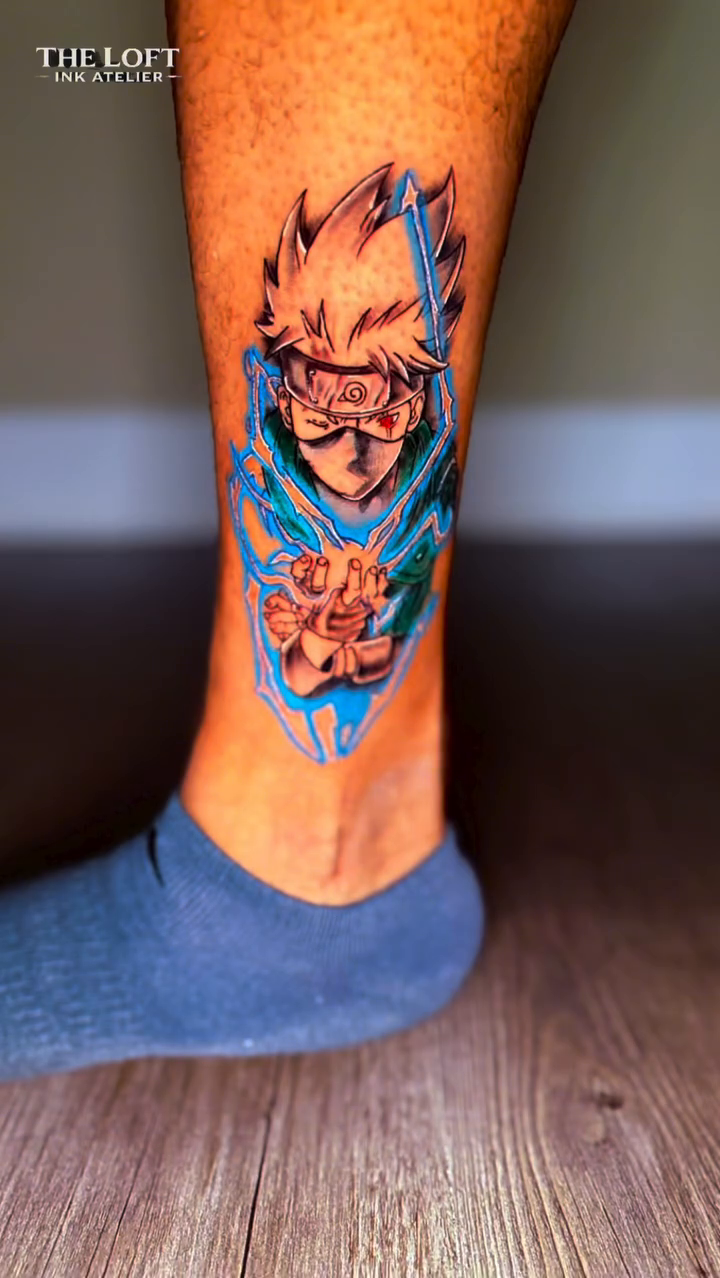 Kakashi Hatake from Naruto anime tattoo on the leg by InkedByJide Tattoo, Atlanta, Georgia