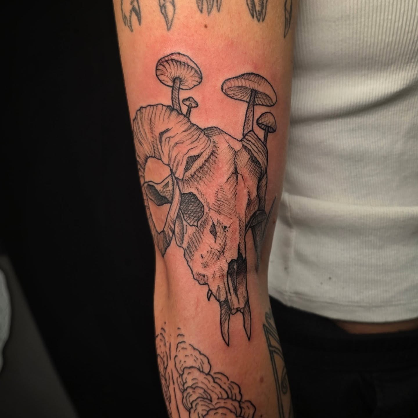 Mushroom skull black and grey tattoo on the forearm by Linda Marroum, Morningside, Maryland