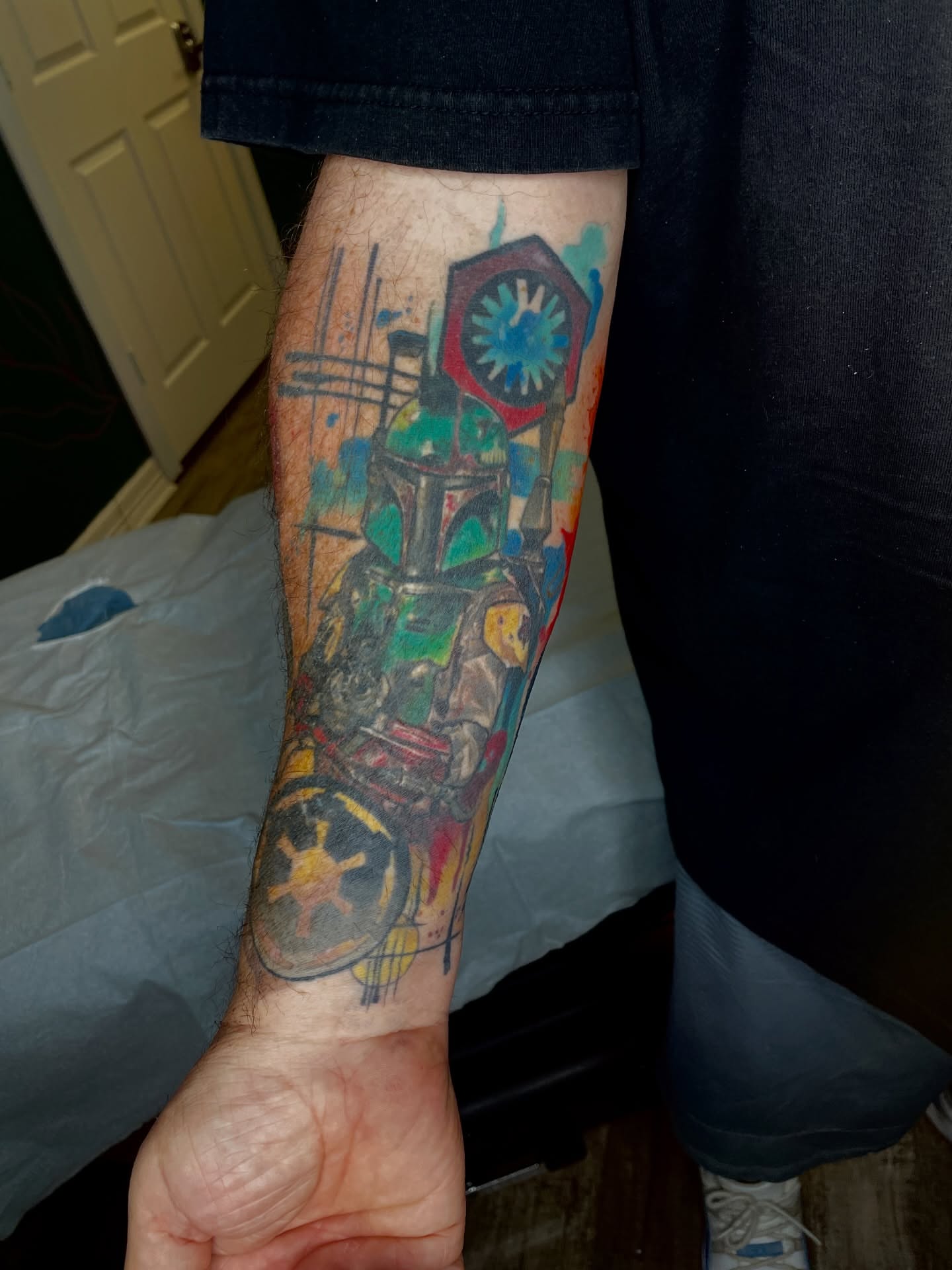 Boba Fett watercolor tattoo on the forearm by Melissa Rose Moya