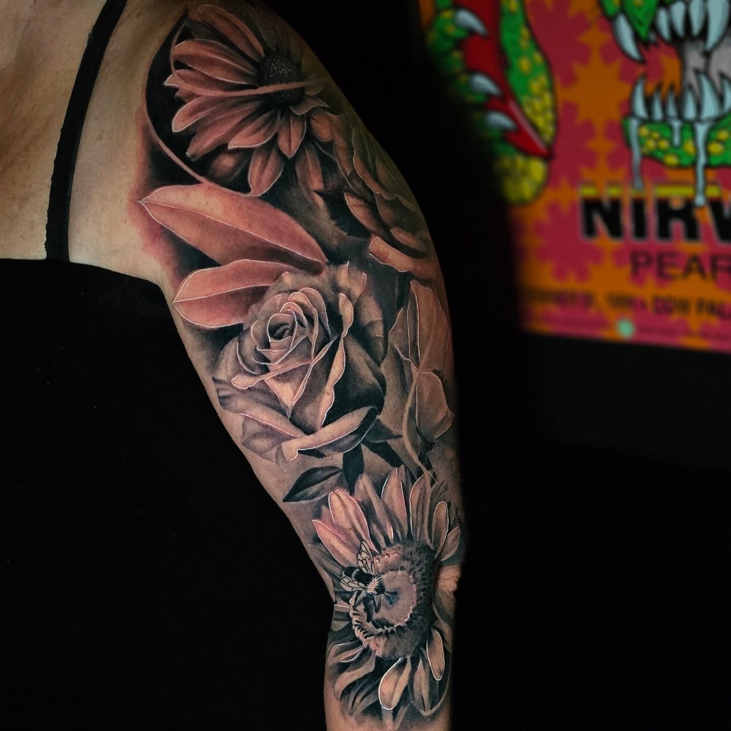 Flowers realism tattoo on the forearm by Myth & Mercy Tattoo Co.