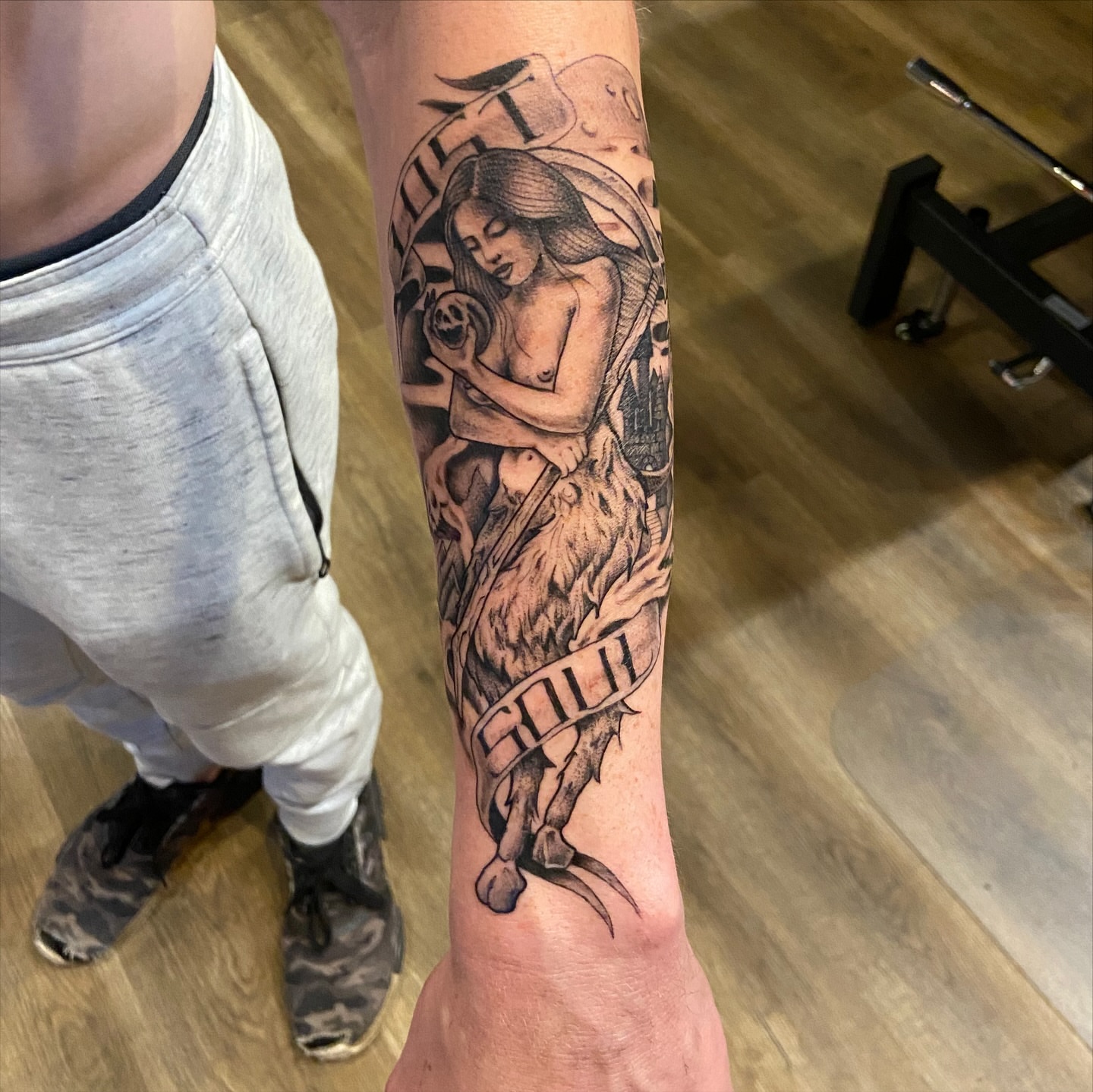 Woman with skull realism tattoo on the forearm by Anthony Robles