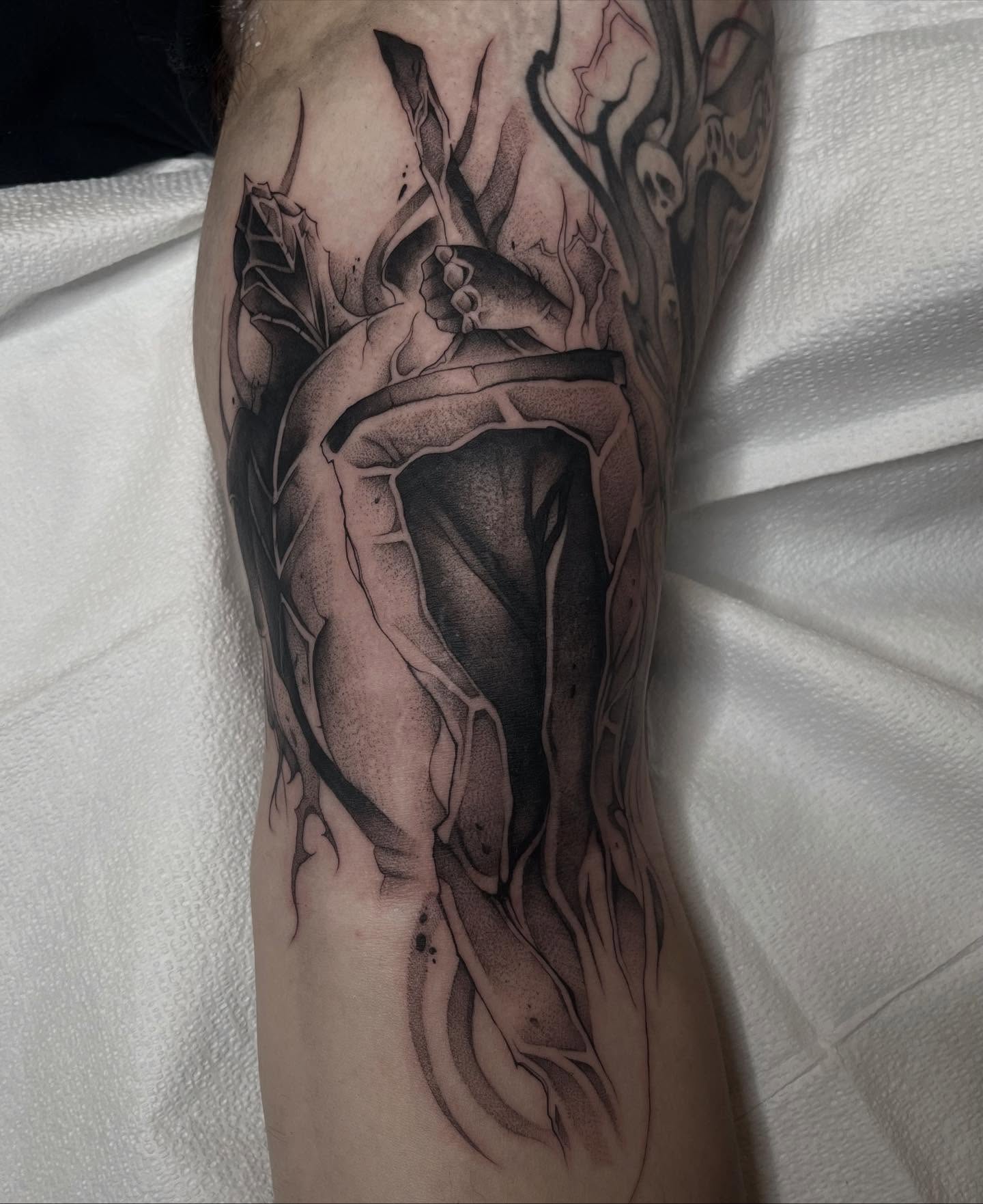 Heart with roots realism tattoo on the forearm by April Jay