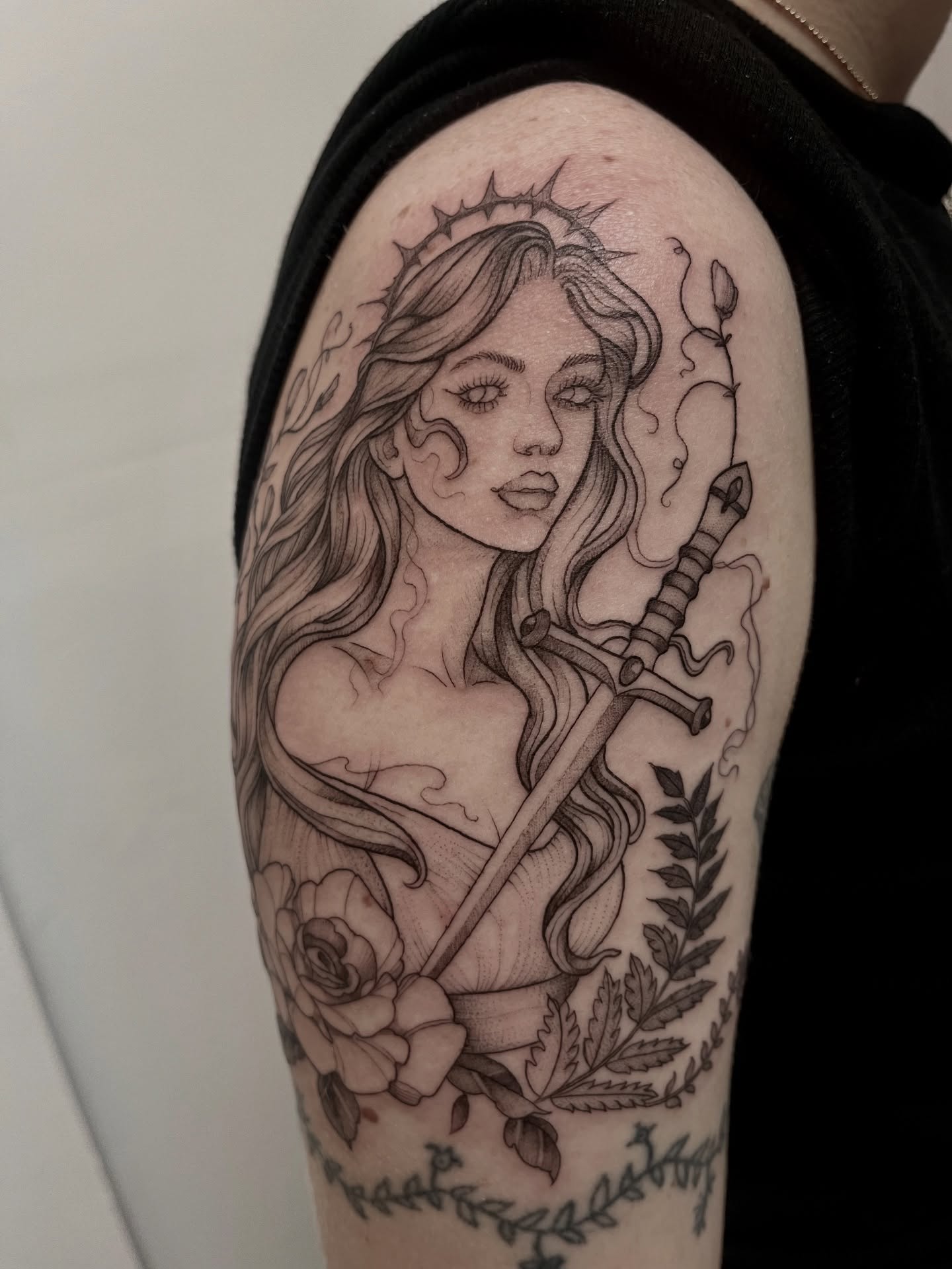 Woman with sword realism tattoo on the forearm by Lo Gwynn