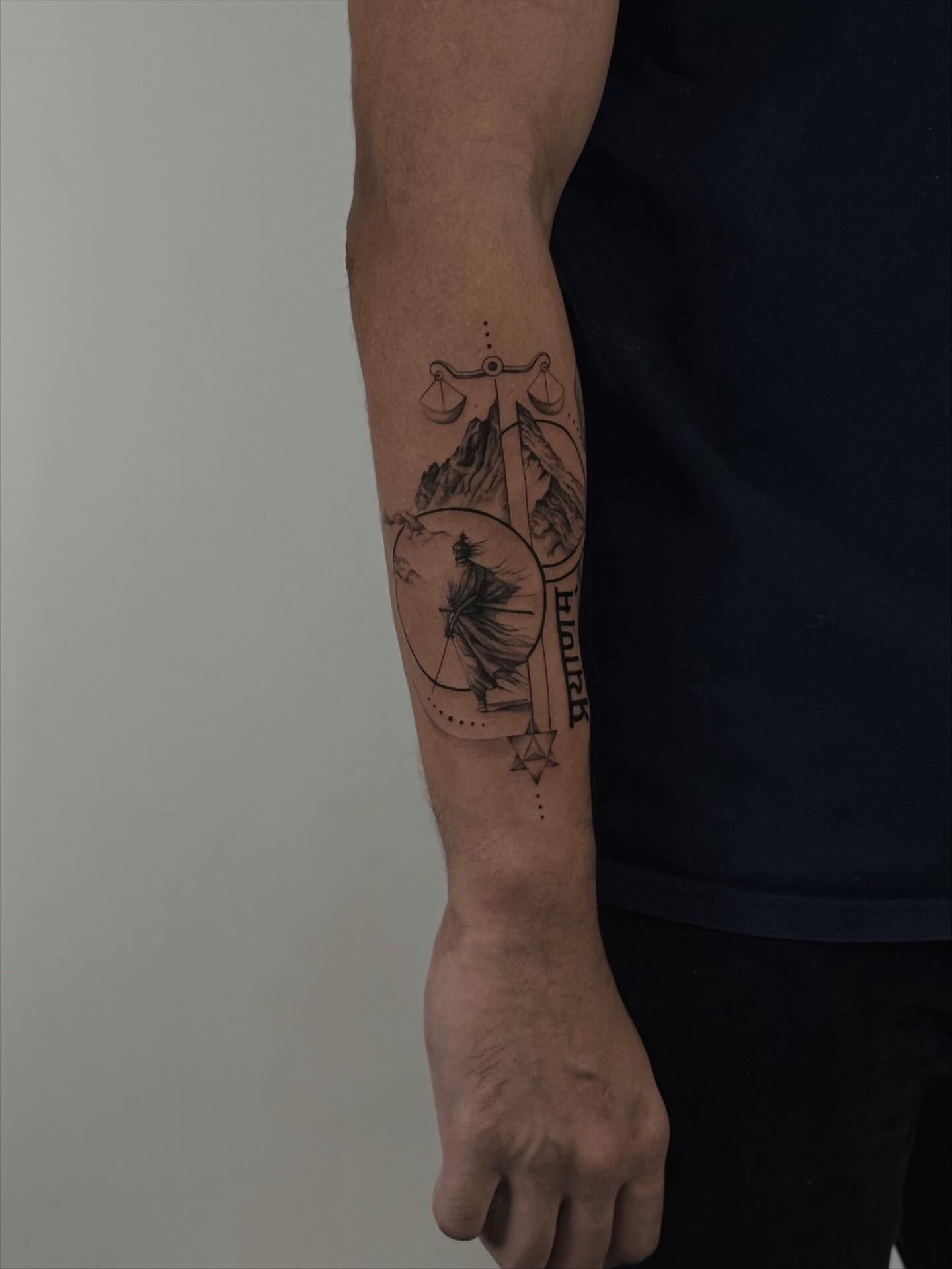 Scale and landscape black and grey tattoo on the forearm by ᴛᴀᴛᴛᴏᴏ ᴀʀᴛɪꜱᴛ 📍Portland, OR