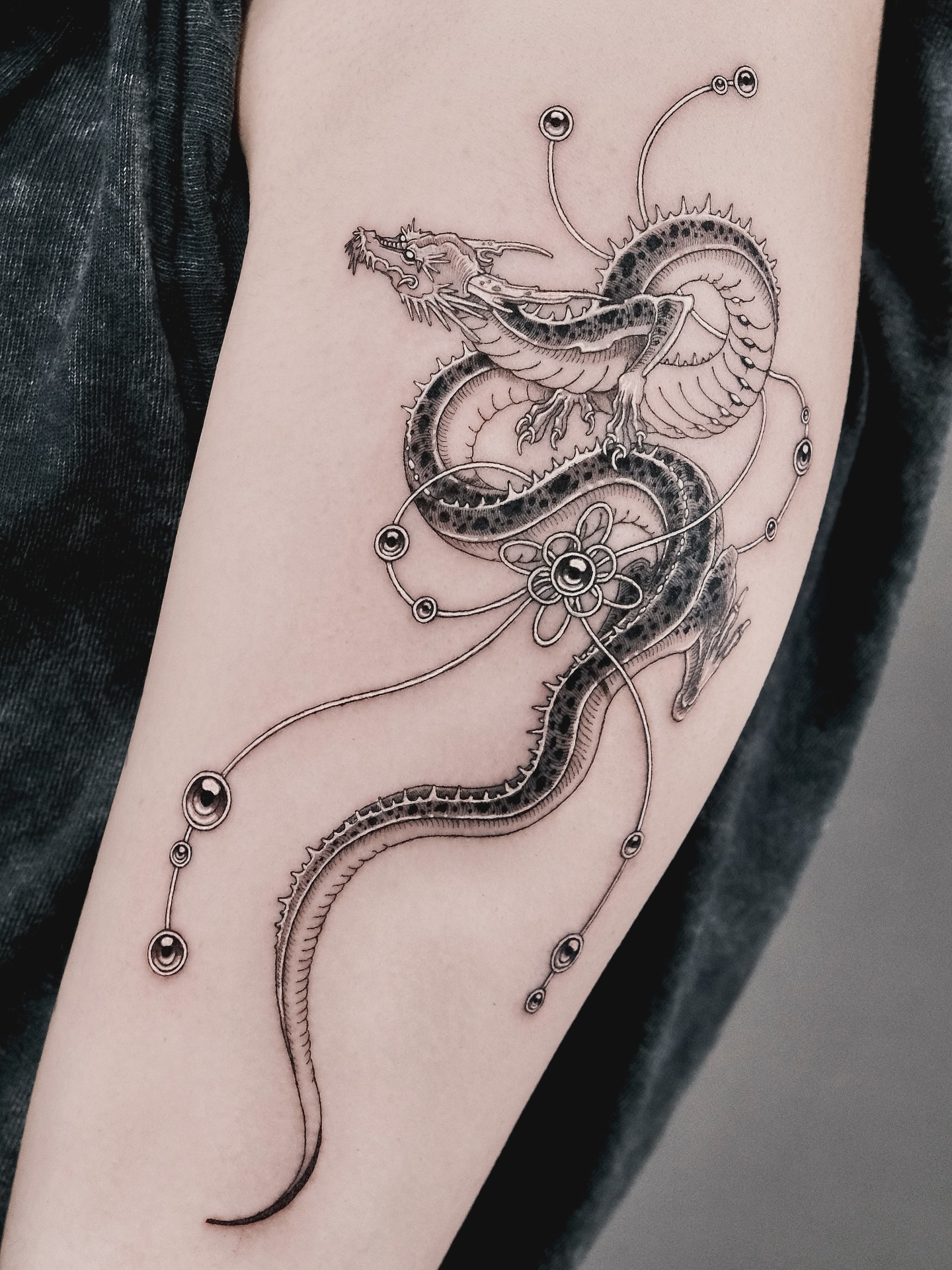 Tattoo by @pobitattoo — dotwork, geometric