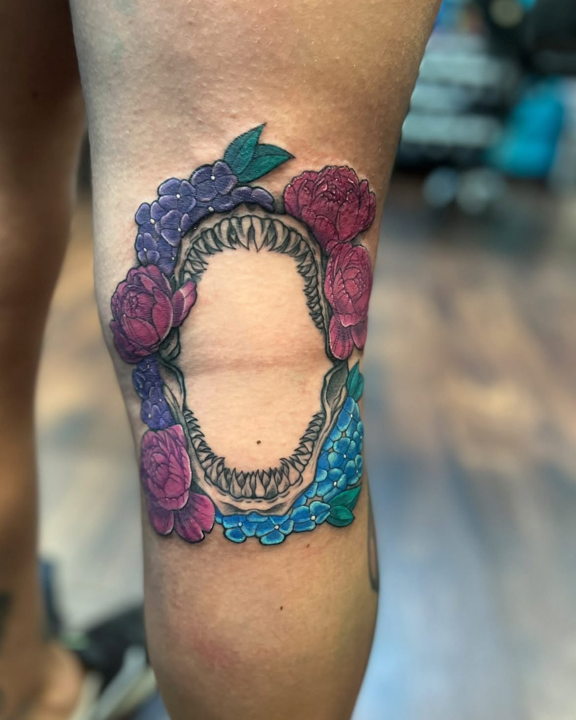 Floral wreath dotwork tattoo on the forearm by Chelsea Nichole