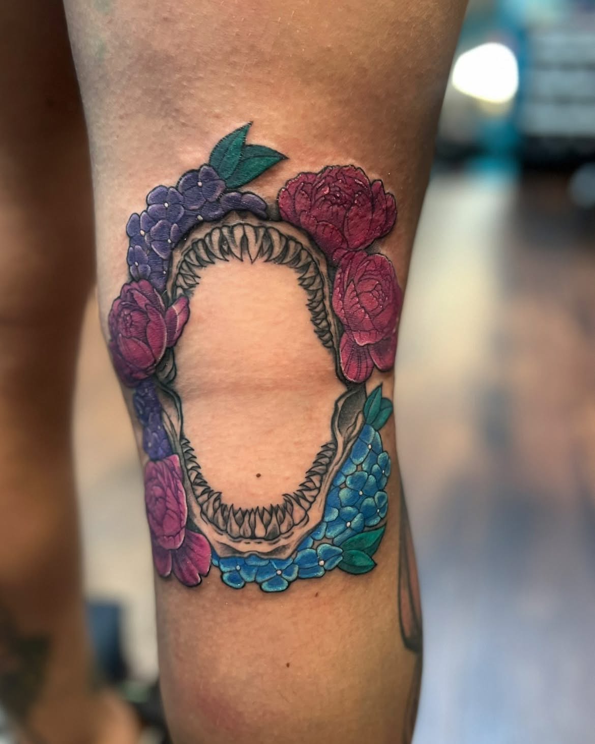 Flower wreath neo-traditional tattoo on the forearm by Chelsea Nichole