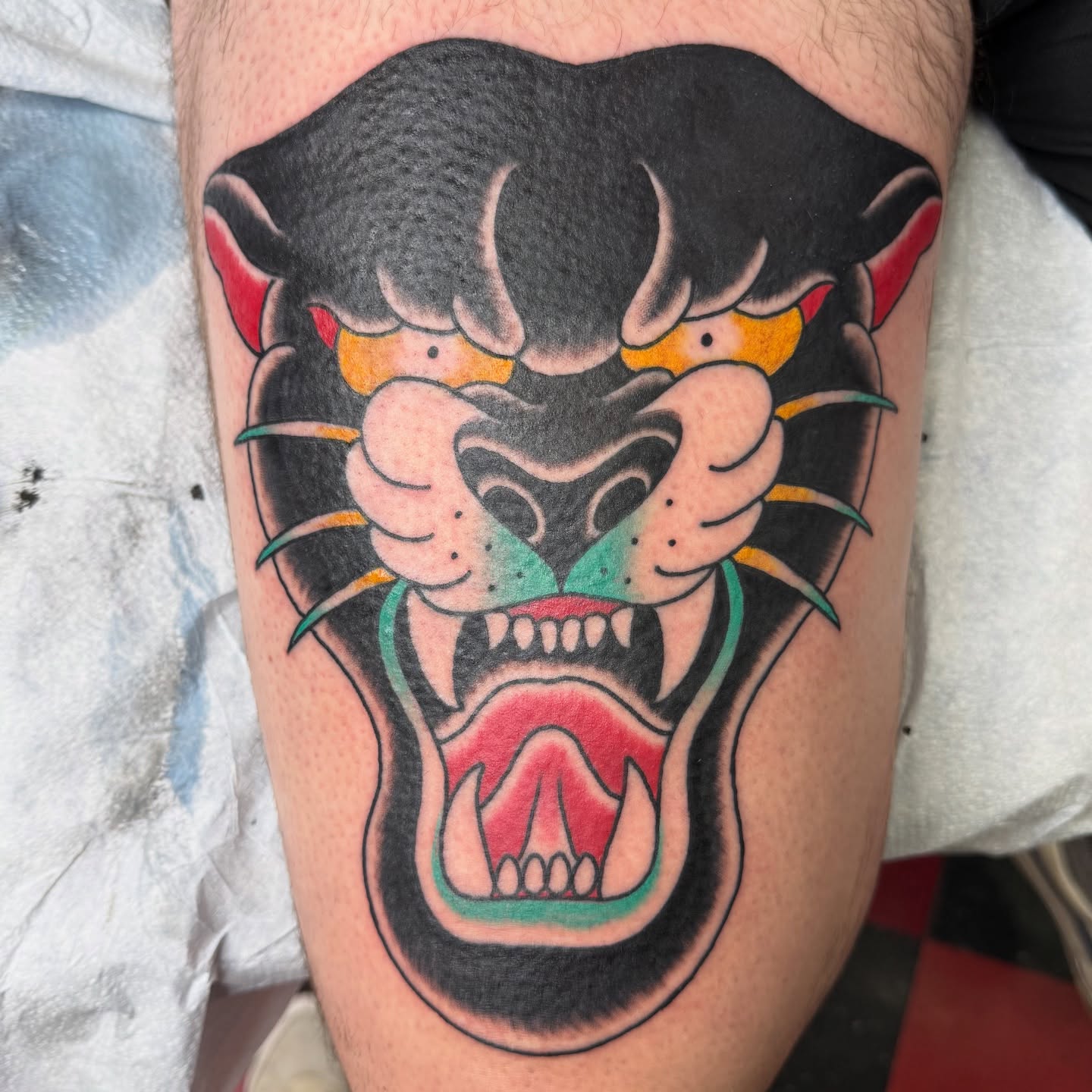 Panther American traditional tattoo on the thigh by DemianThompson