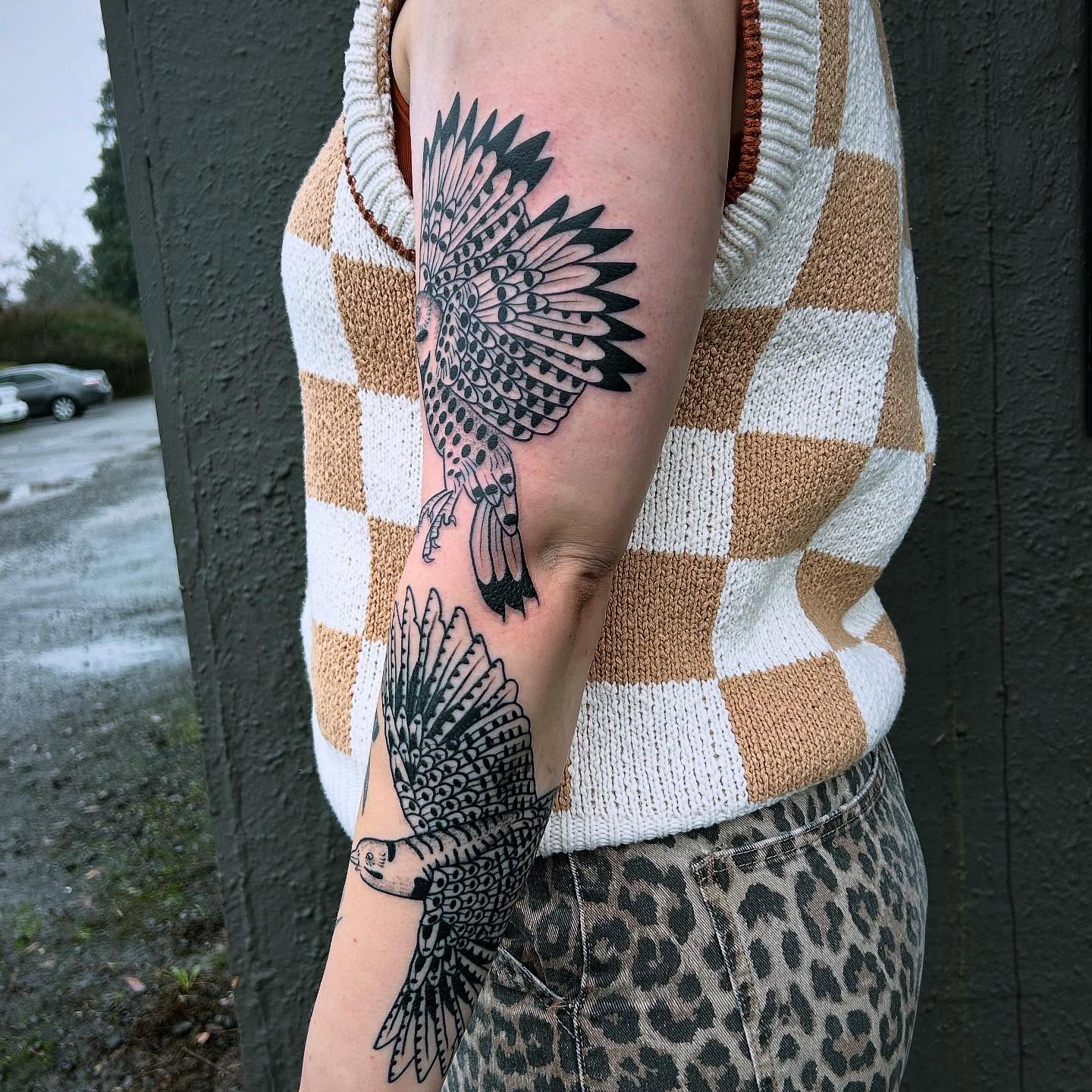 Birds American traditional tattoo on the forearm by Erica Finley