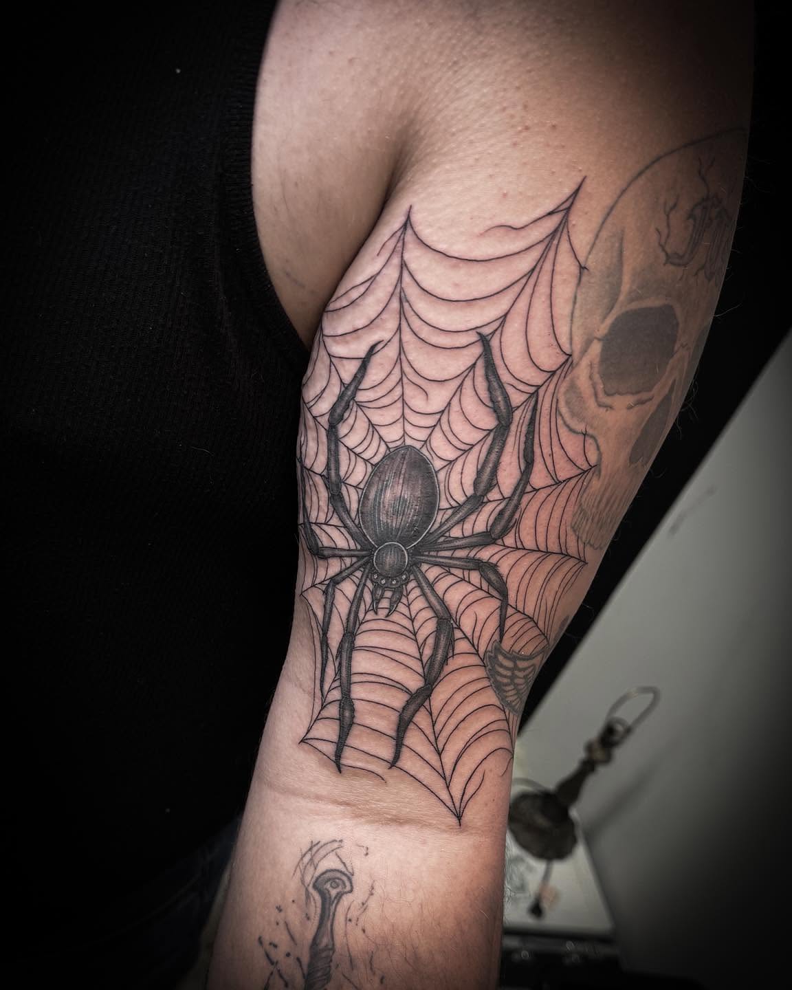 Spider web realism tattoo on the forearm by 𝔻𝕖𝕣𝕣𝕚𝕔𝕜 𝔹𝕦𝕪𝕖𝕒, East Aurora, New York