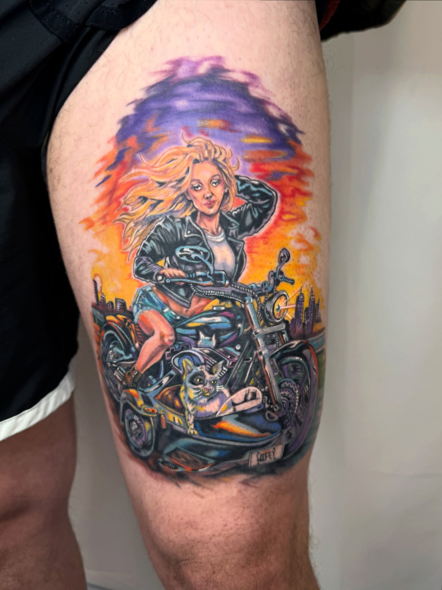 Motorcycle rider realism tattoo on the thigh by Franky A Bonifacio, Seattle, Washington