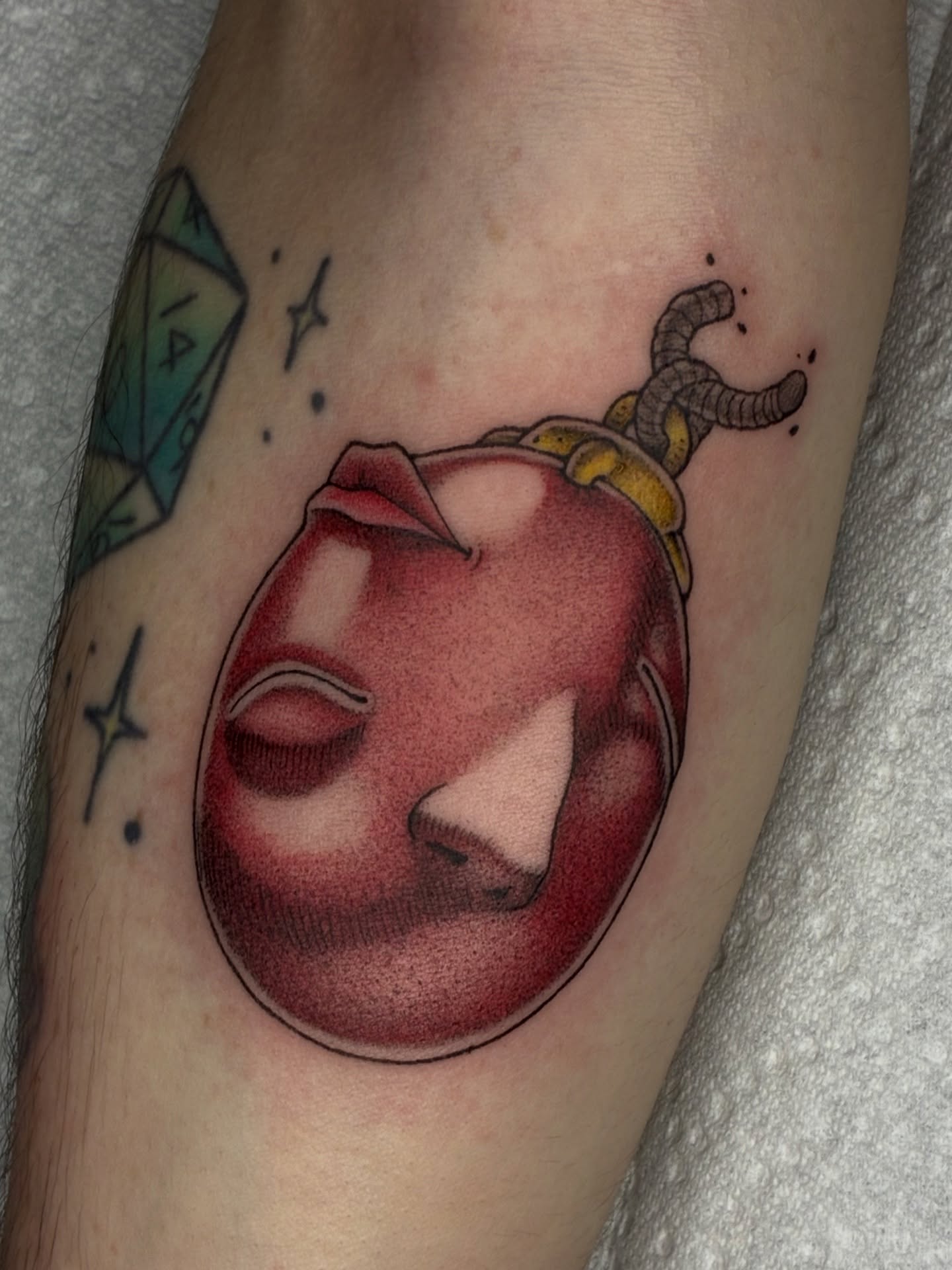 Apple realism tattoo on the forearm by Lance 🦈
