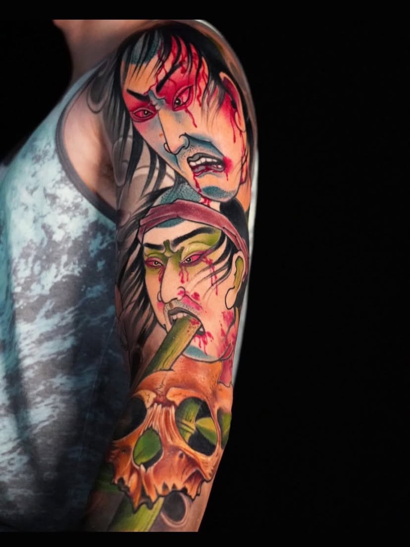 Zombie heads dark realism tattoo on the forearm by Grego Hernandez, Miami, Florida