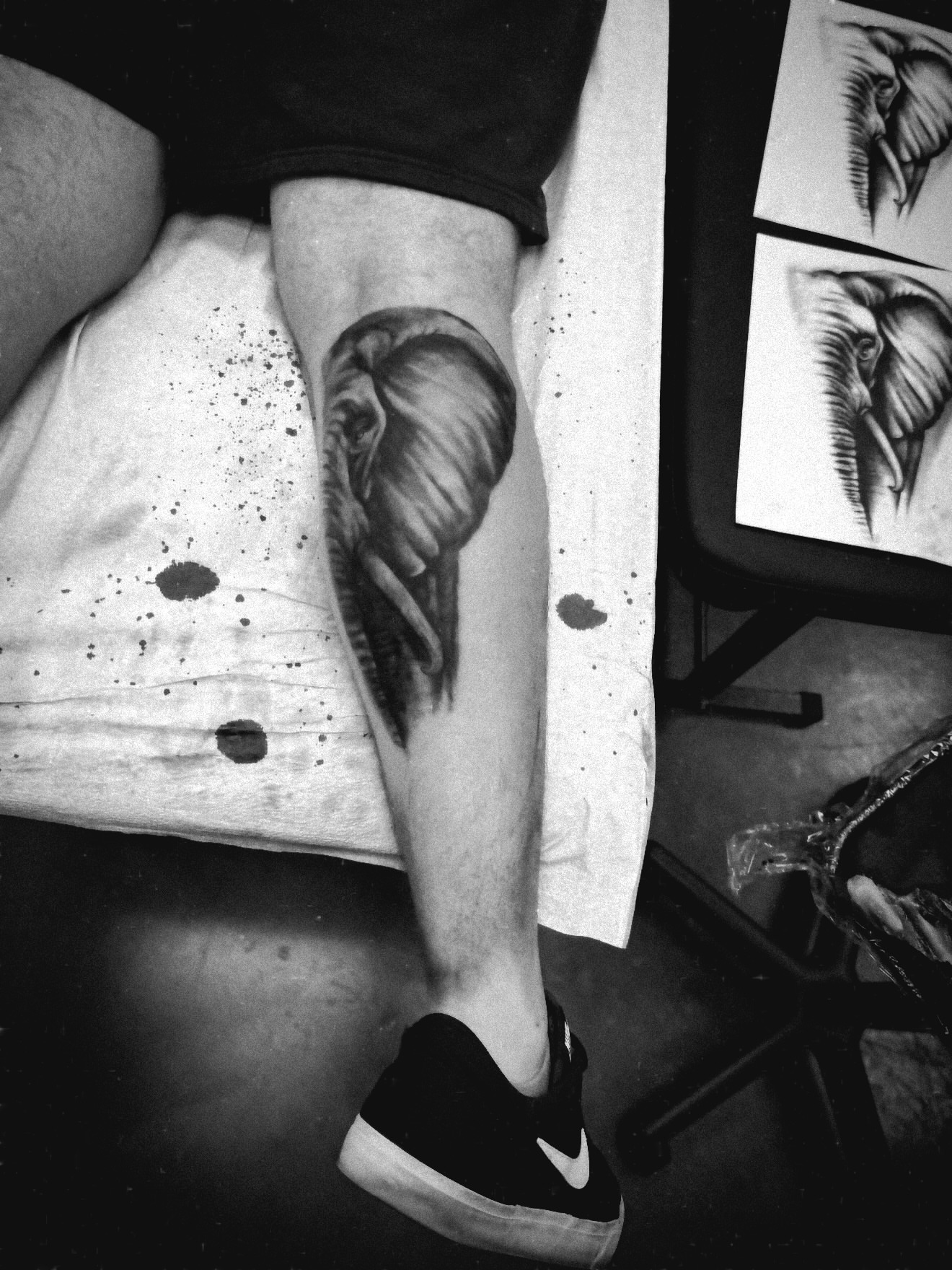 Elephant trunk black and grey tattoo on the forearm by Julian Olson