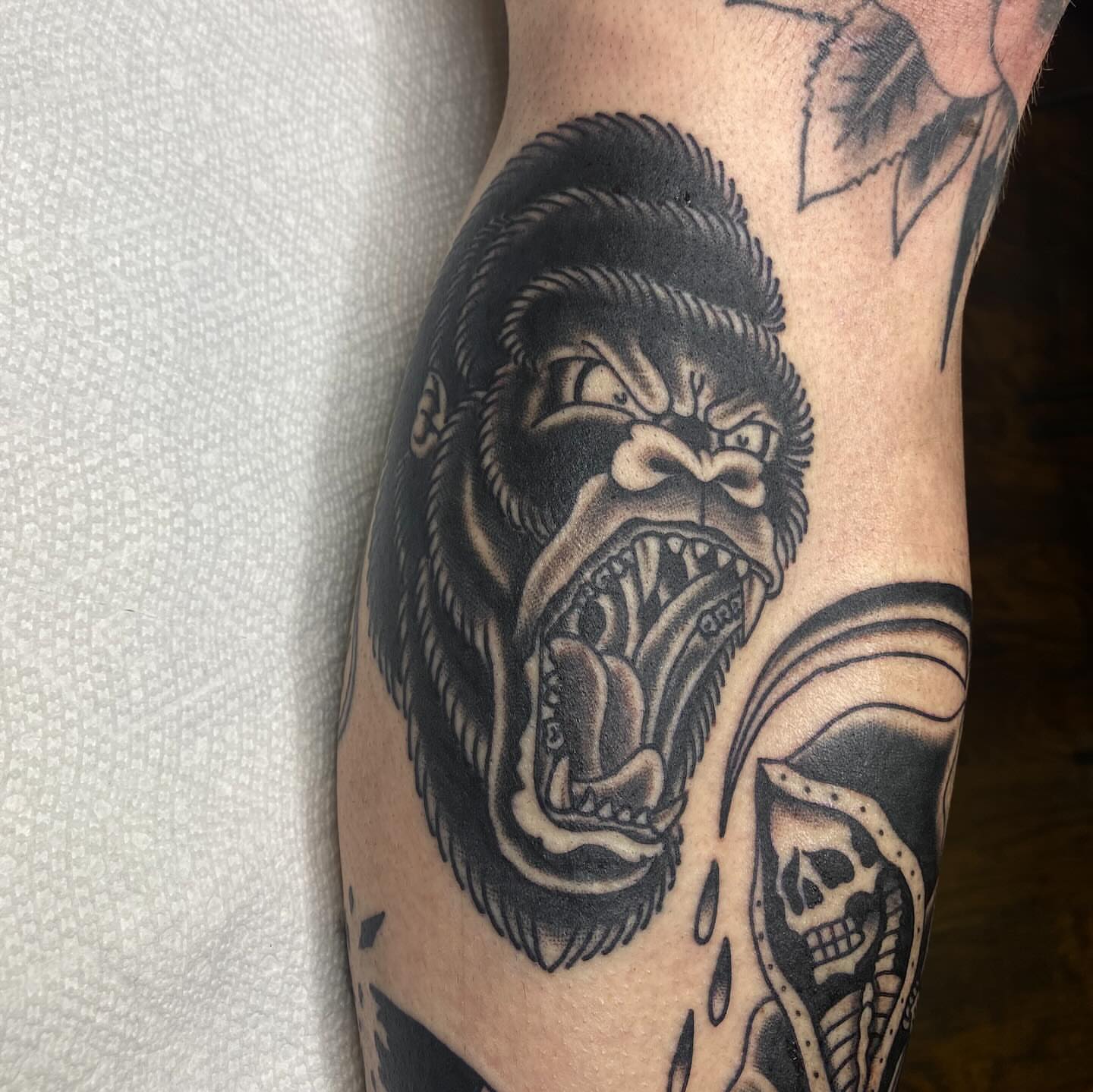 Gorilla realism tattoo on the forearm by Thomas Cook