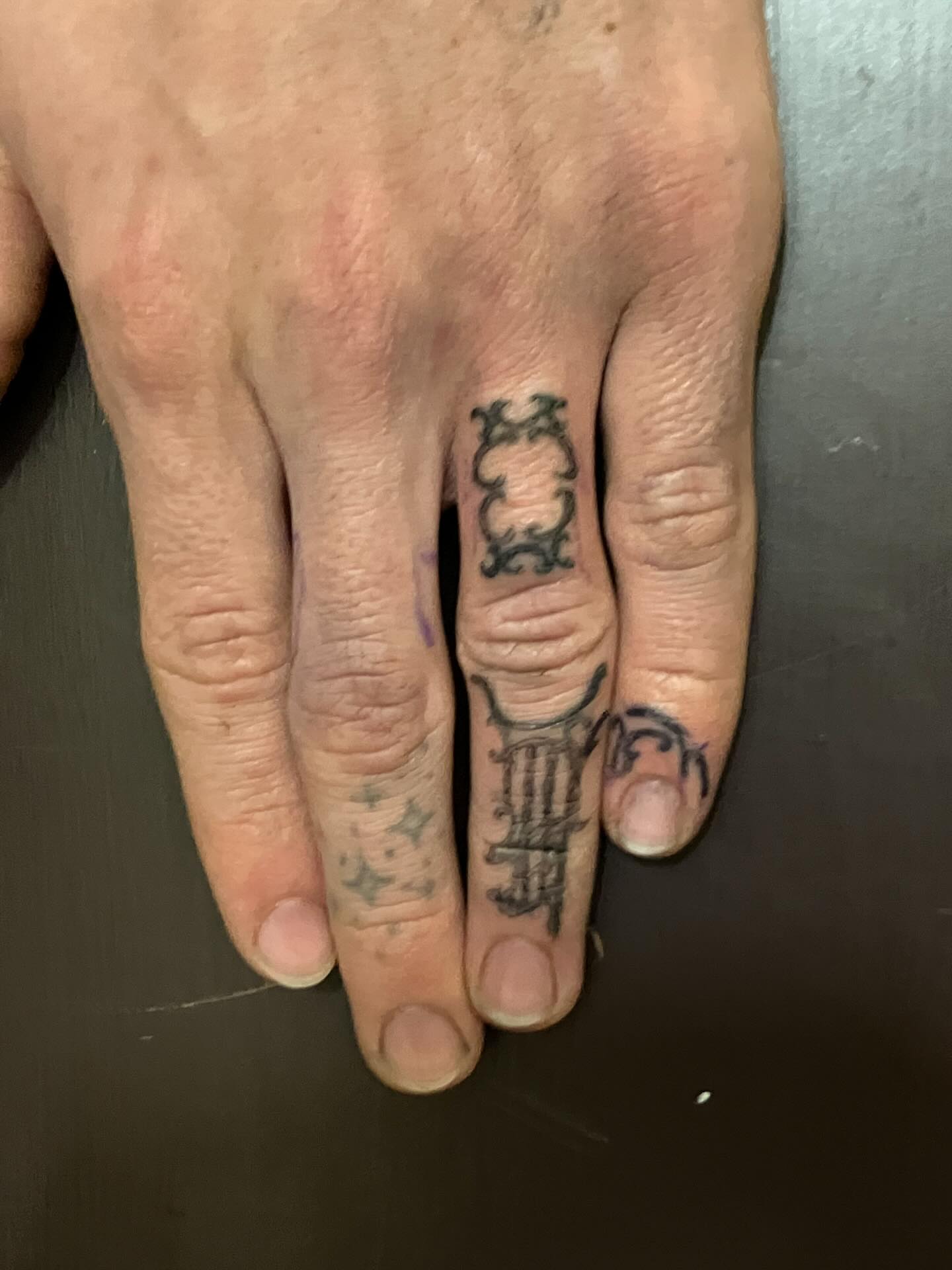 Scrollwork ornamental tattoo on the hand by Sashka