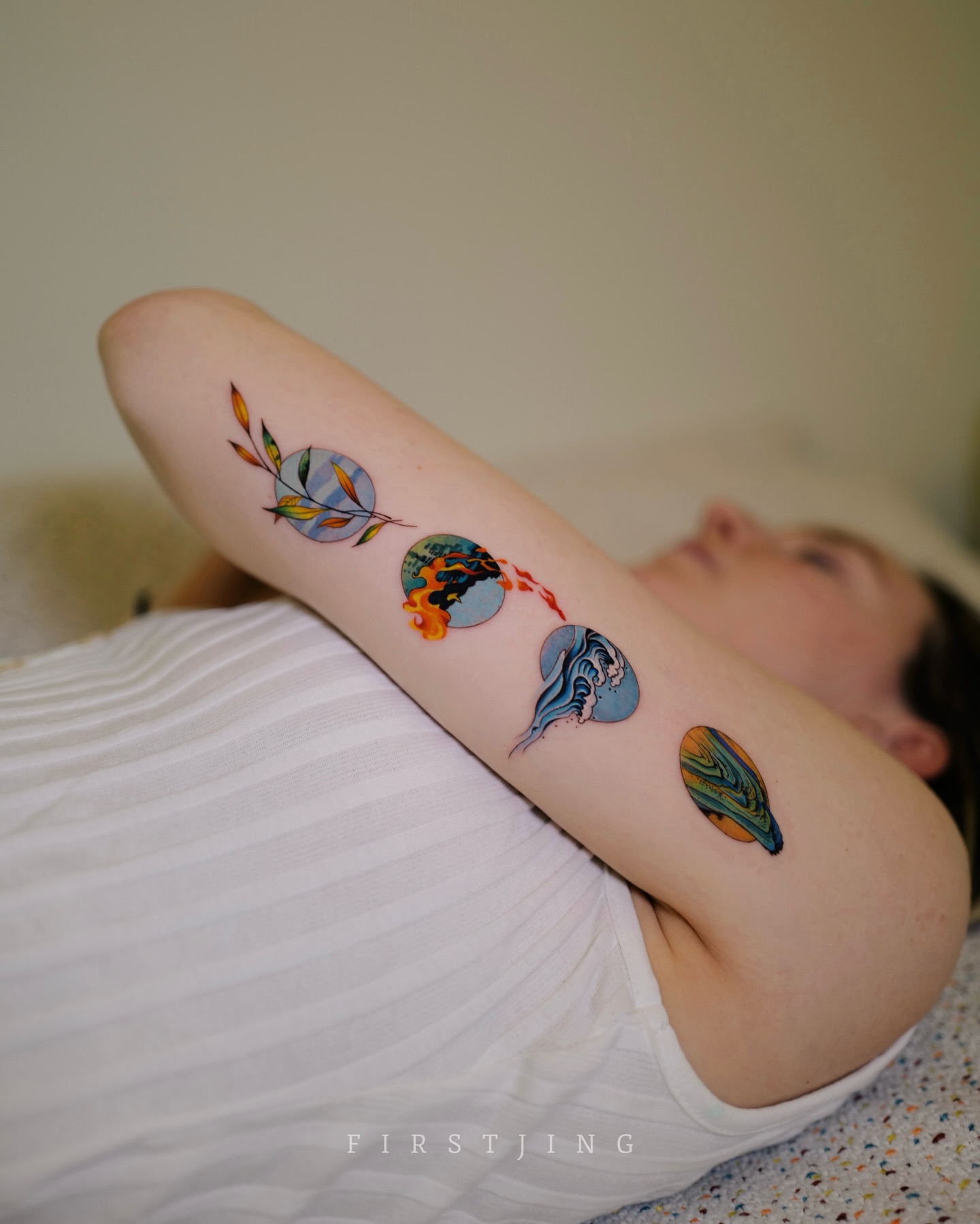 Seasonal motifs new school tattoo on the forearm by Seattle