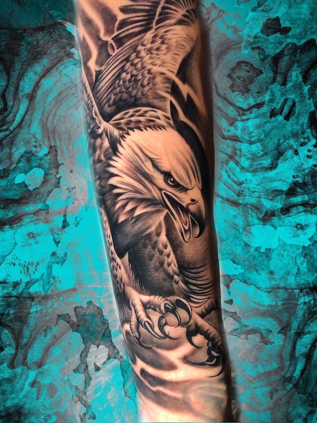 Eagle with lightning Japanese tattoo on the forearm by Luis Chauta