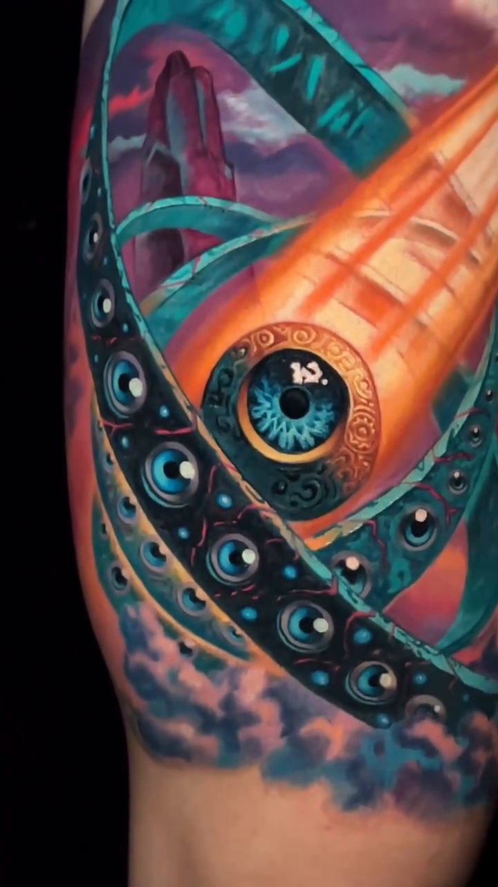 Cosmic eye with tentacles dark realism tattoo by Sean Foy