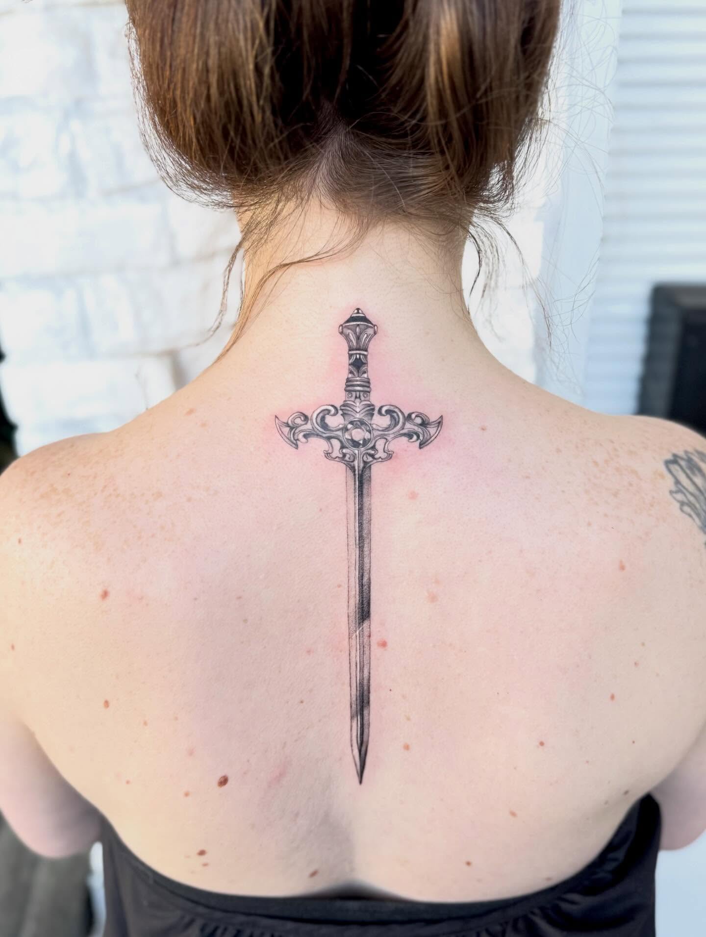 Sword black and grey tattoo on the back by Lily Cuoio~ Seattle