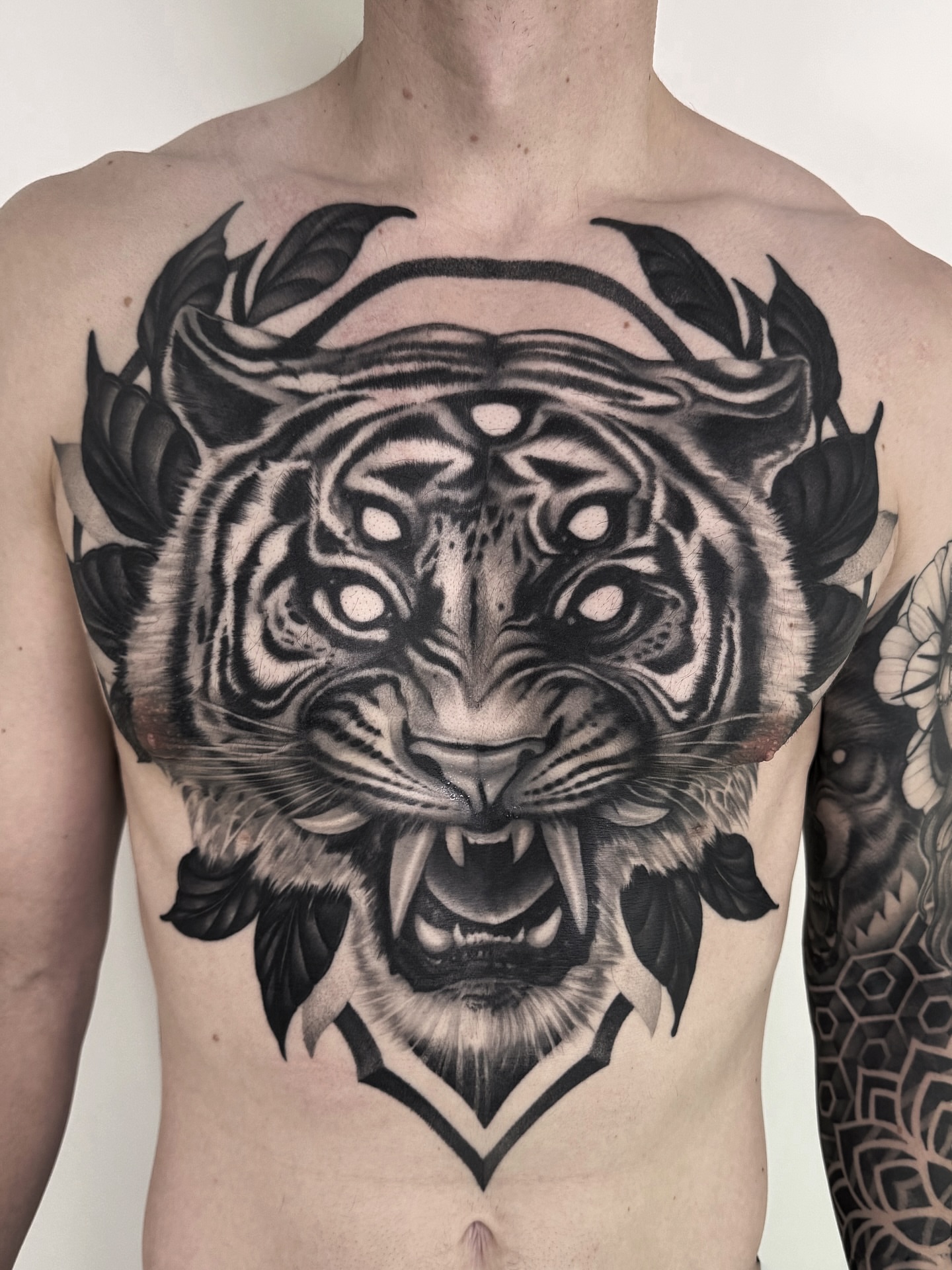 Tattoo by @ninjakixxtattoo — black_and_grey, realism