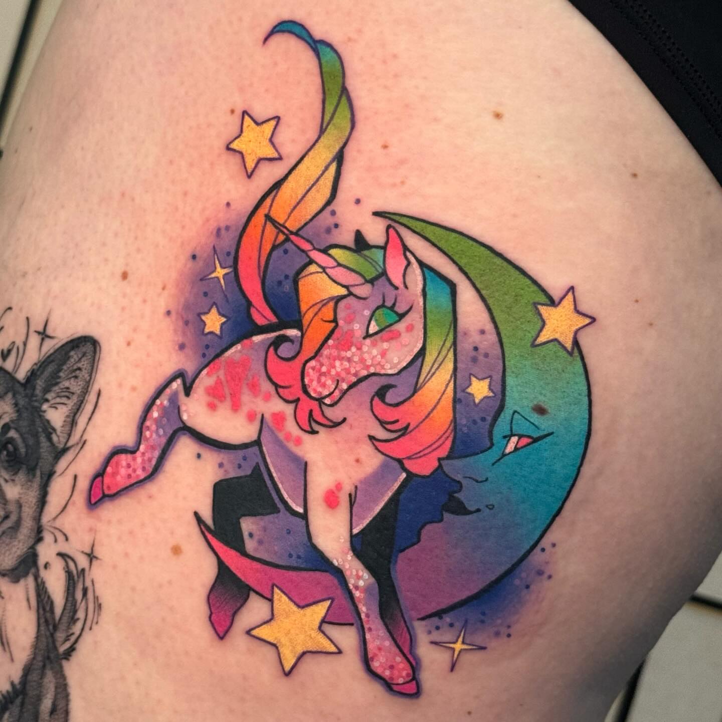 Rainbow unicorn new school tattoo on the thigh by Taylor Nicoll Chunn