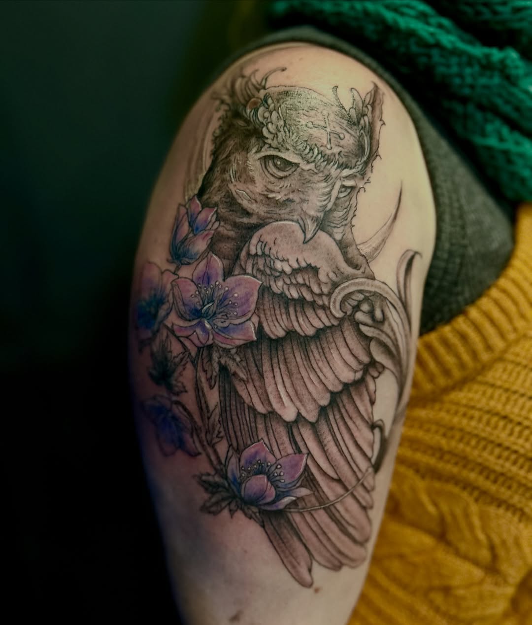 Owl with flowers fine line tattoo on the forearm by Tim Andrews