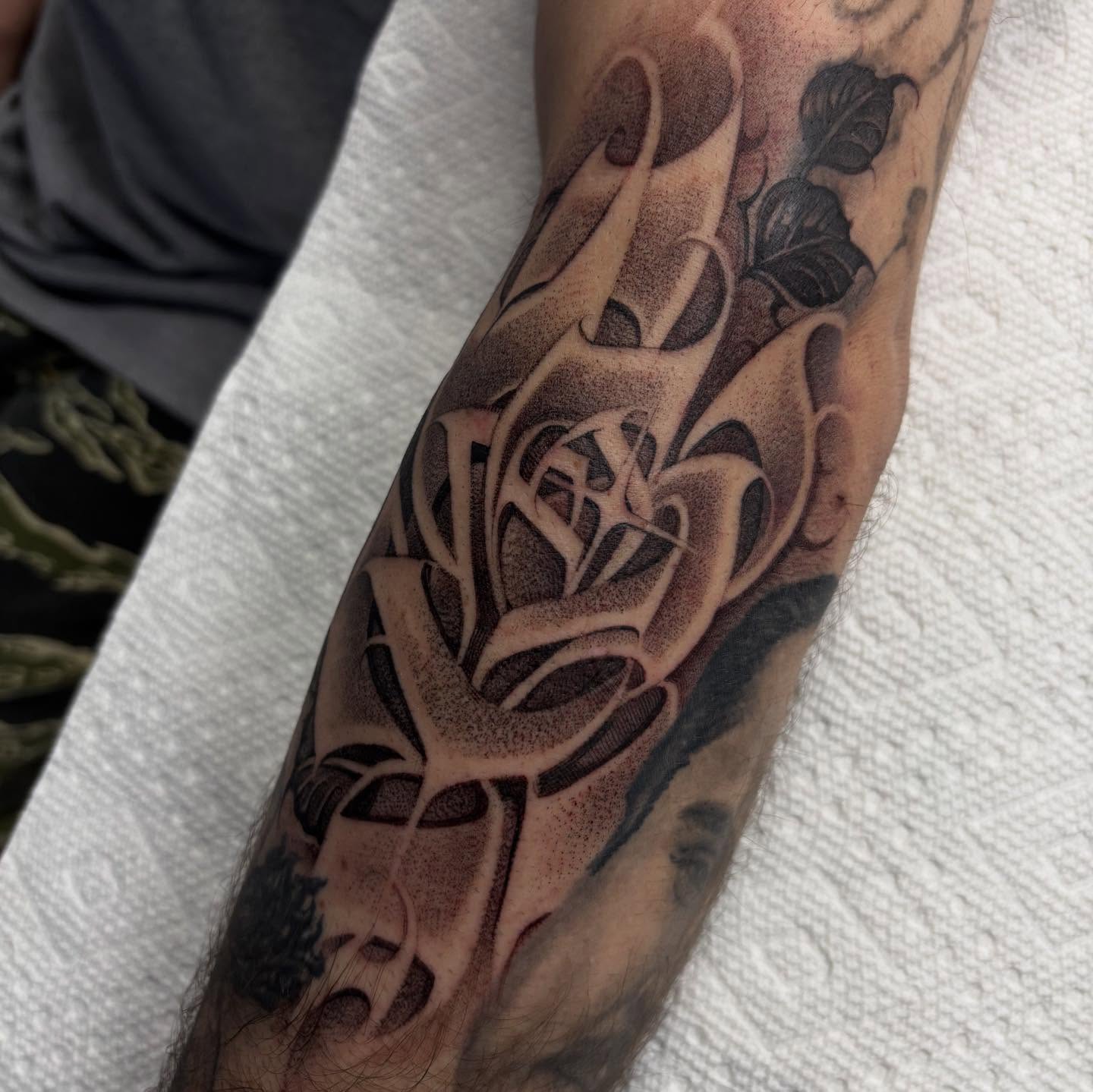 Rose black and grey tattoo on the forearm by Ashley brown, Las Vegas, Nevada