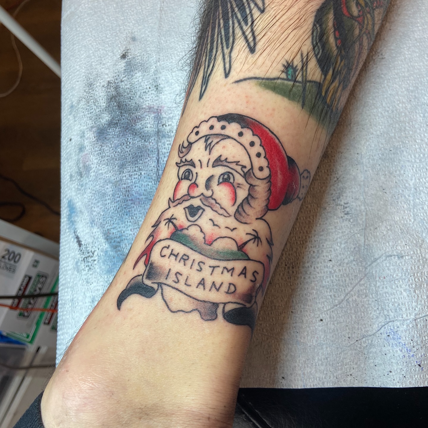 Snowman American traditional tattoo on the forearm by Anthony Robles