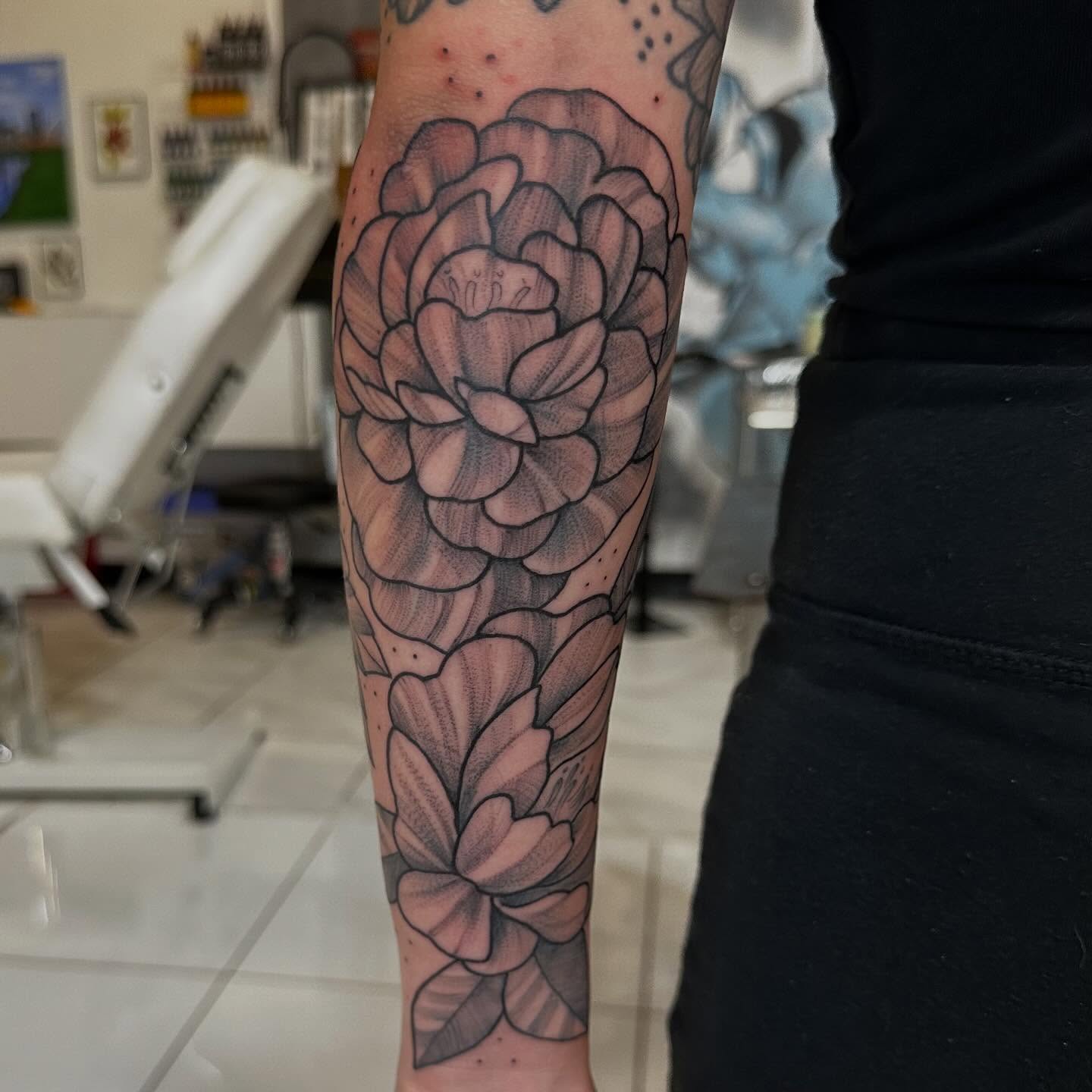 Peony dotwork tattoo on the forearm by Raul Najera Tattoo, Plano, Texas