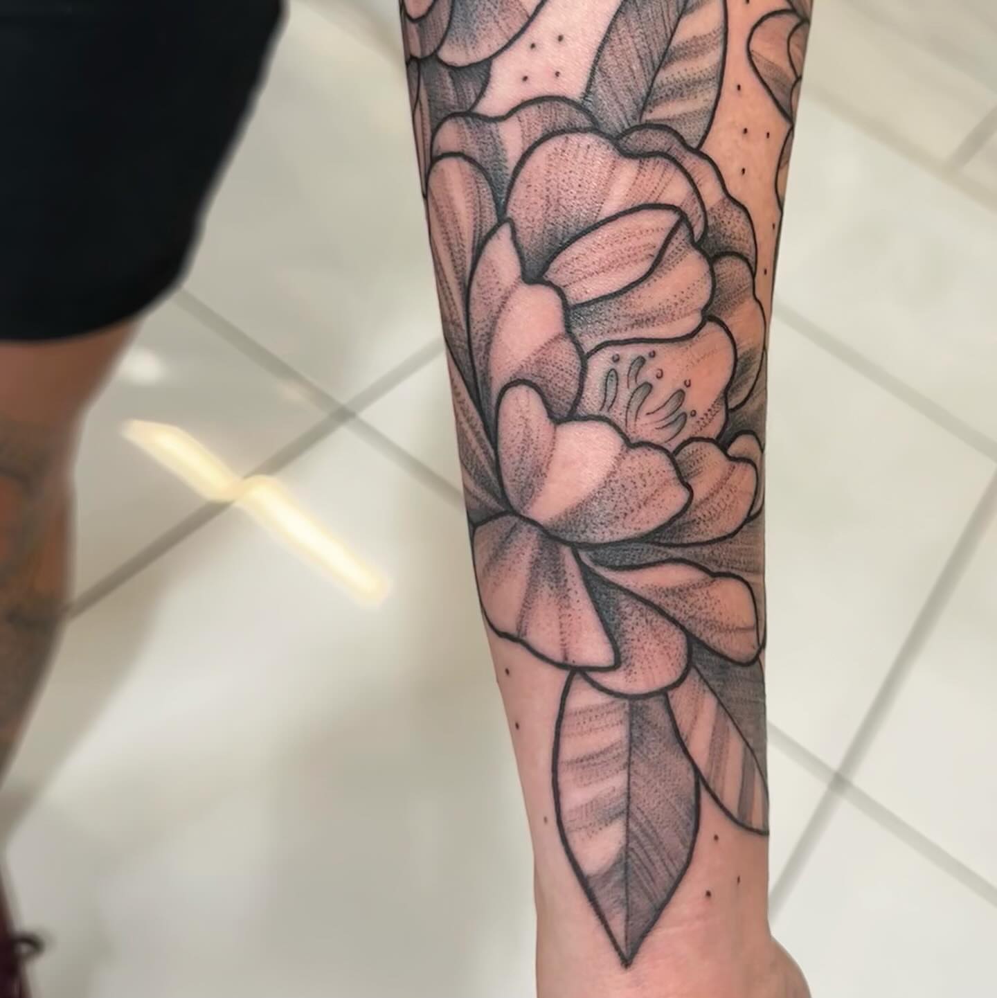 Flower dotwork tattoo on the forearm by Raul Najera Tattoo, Plano, Texas