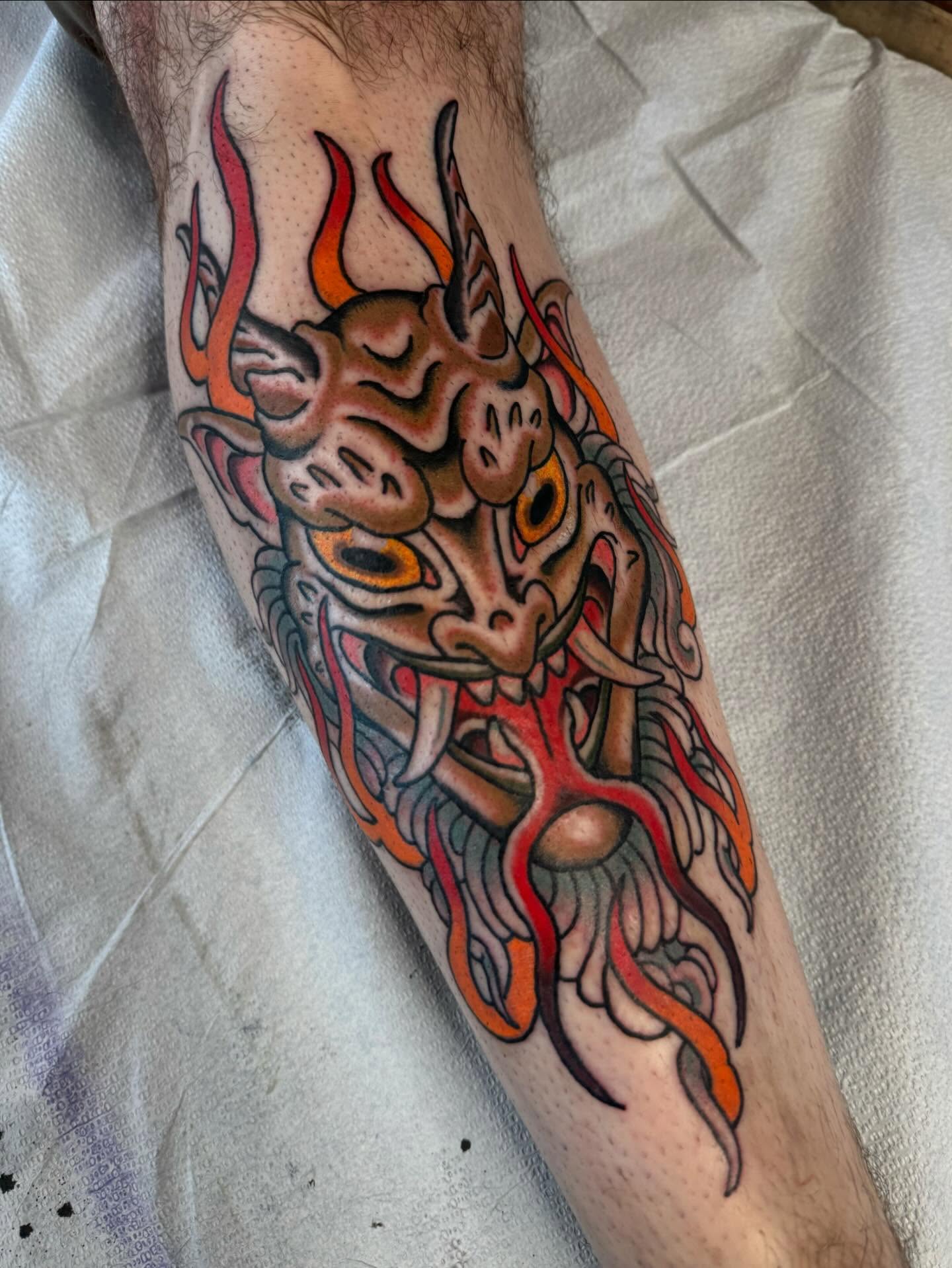 Demon head American traditional tattoo on the forearm by B