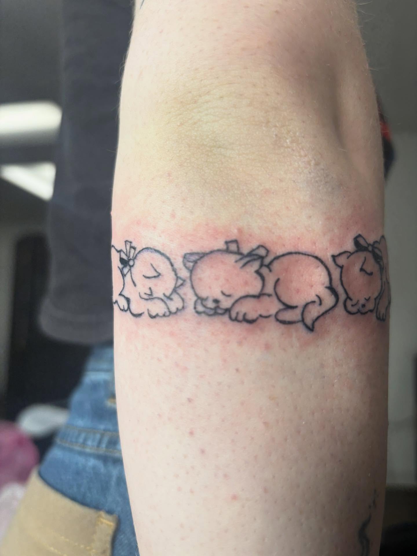 Sleeping cats dotwork tattoo on the forearm by Mickey