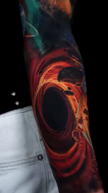 Cosmic scene with black hole realism tattoo by B R A D C H A R L e S