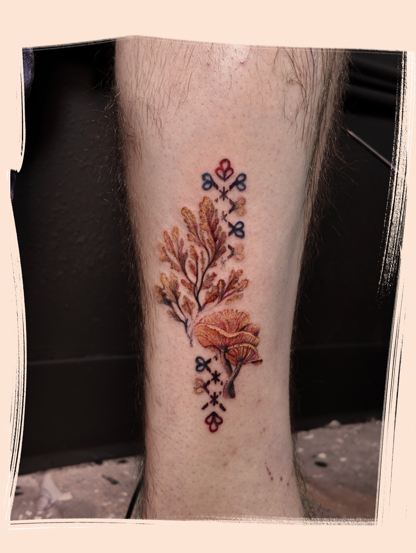 Branch with flowers watercolor tattoo on the forearm by Micah Light (color micro realism, Los Angeles, California