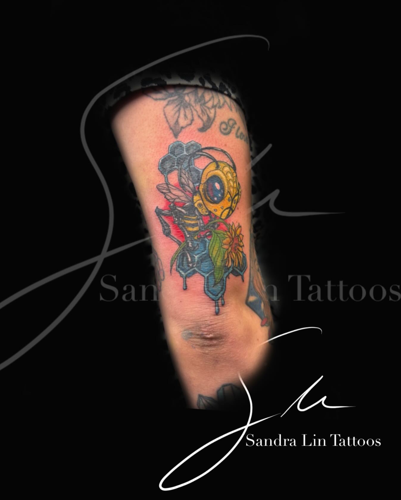 Mechanical eye neo-traditional tattoo on the forearm by Sandra Lin Cue