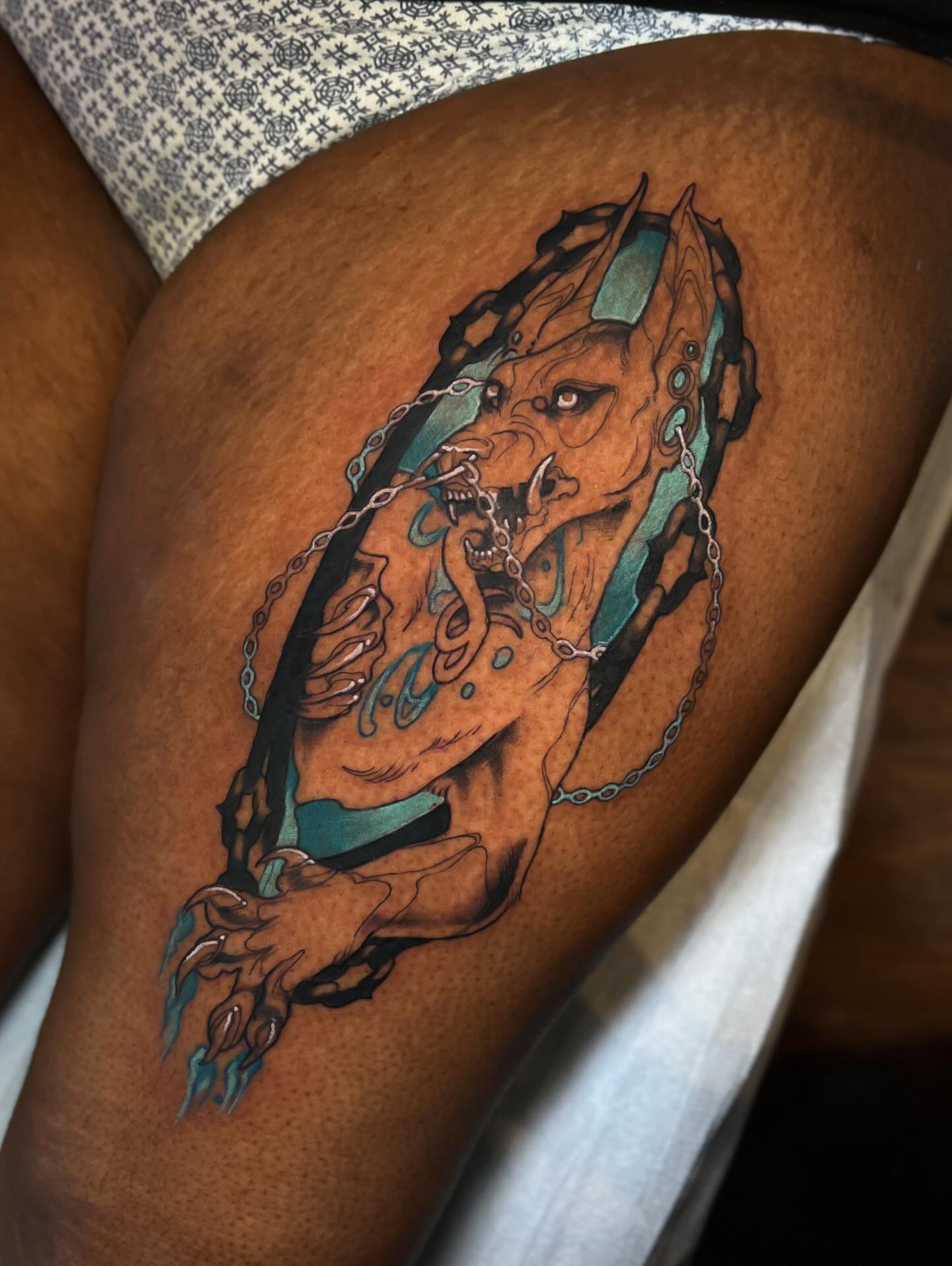Cyborg anime tattoo on the thigh by Jen Love