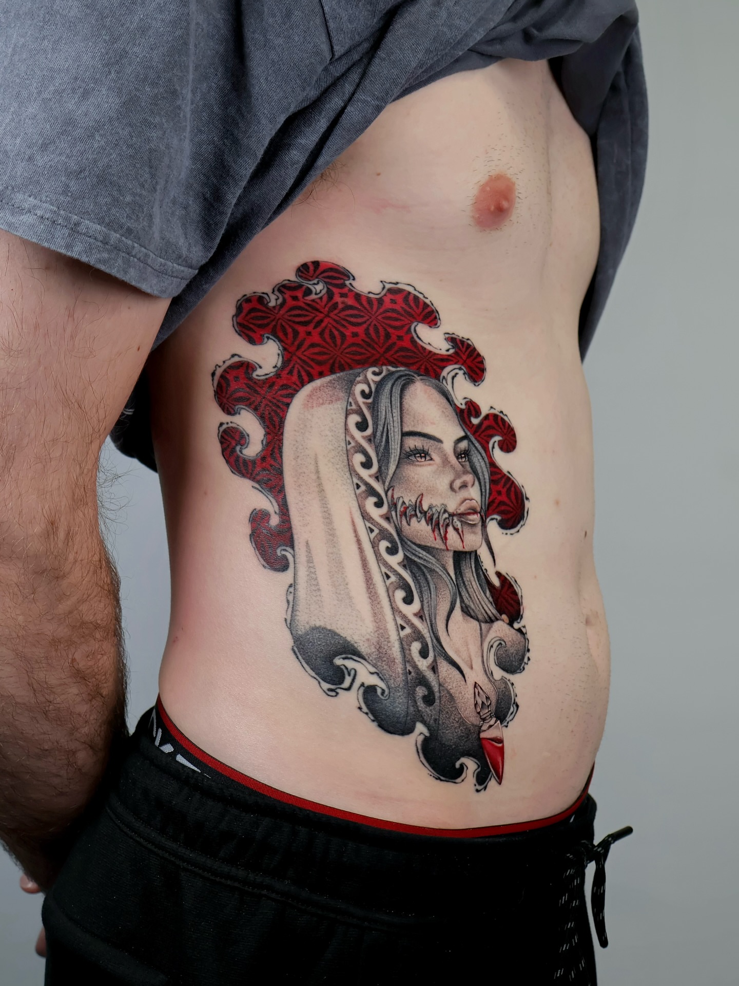 Woman with veil dotwork tattoo on the ribs by MillaKas ° Tattoos