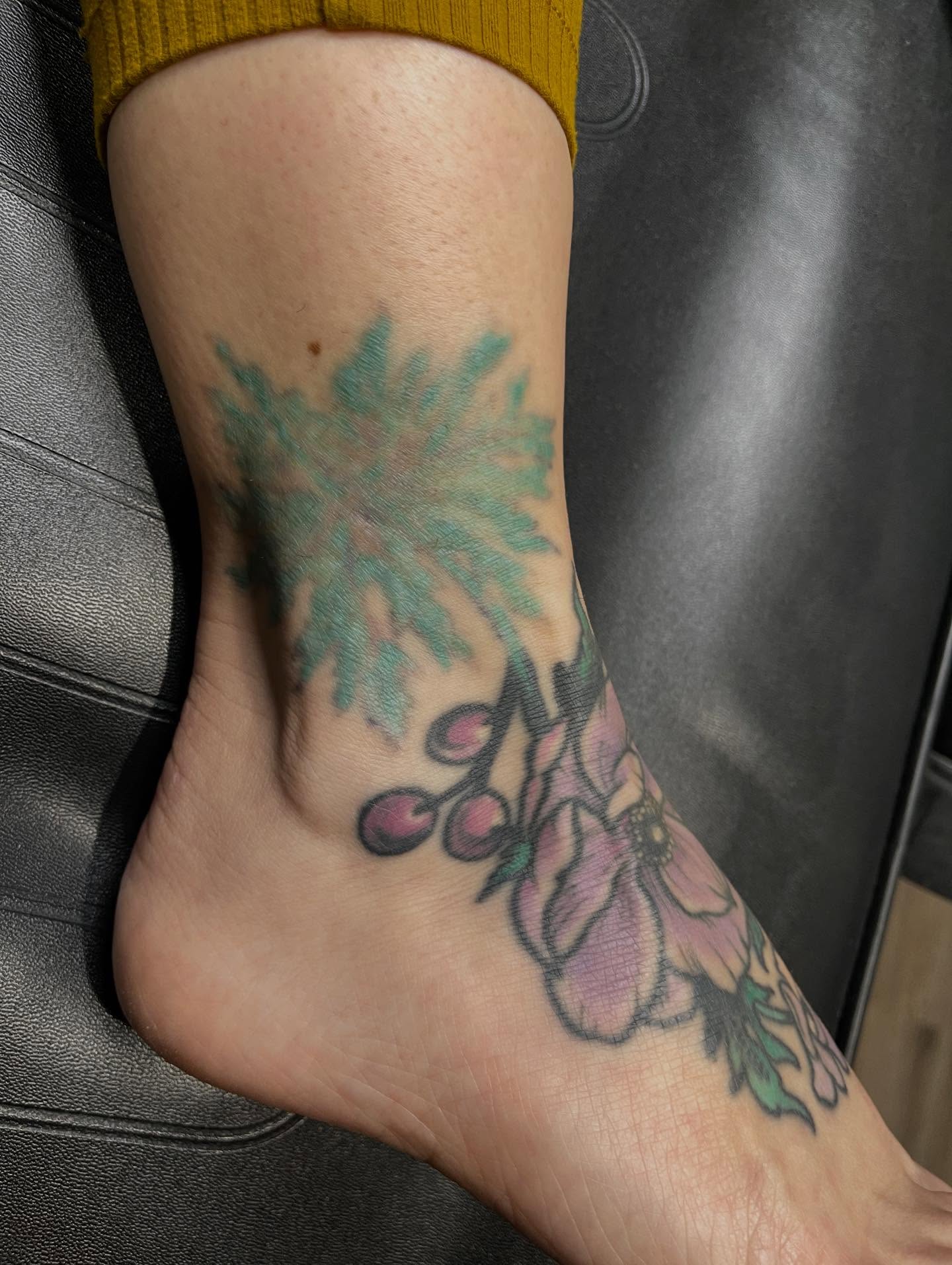 Cherry blossoms and tree new school tattoo on the foot by Allison Gallagher