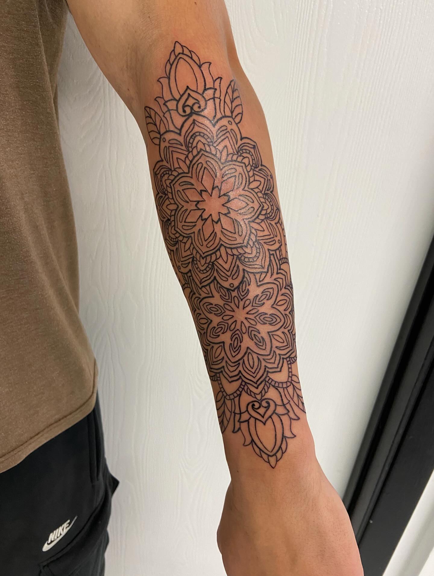 Mandala ornamental tattoo on the forearm by Sophia
