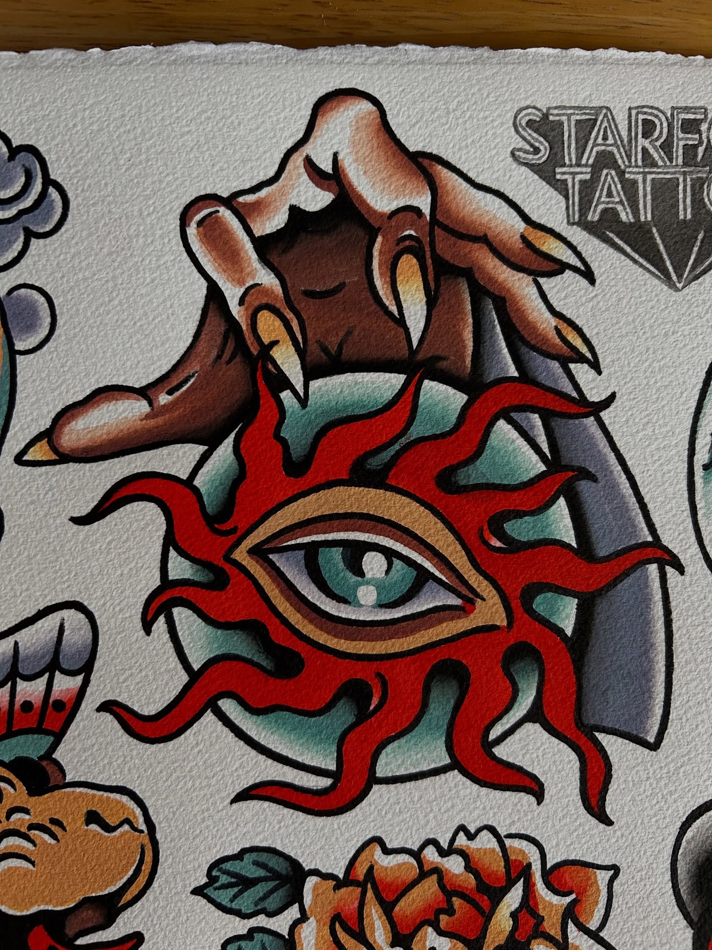 Eye with flames American traditional tattoo by Mitch Hoggard