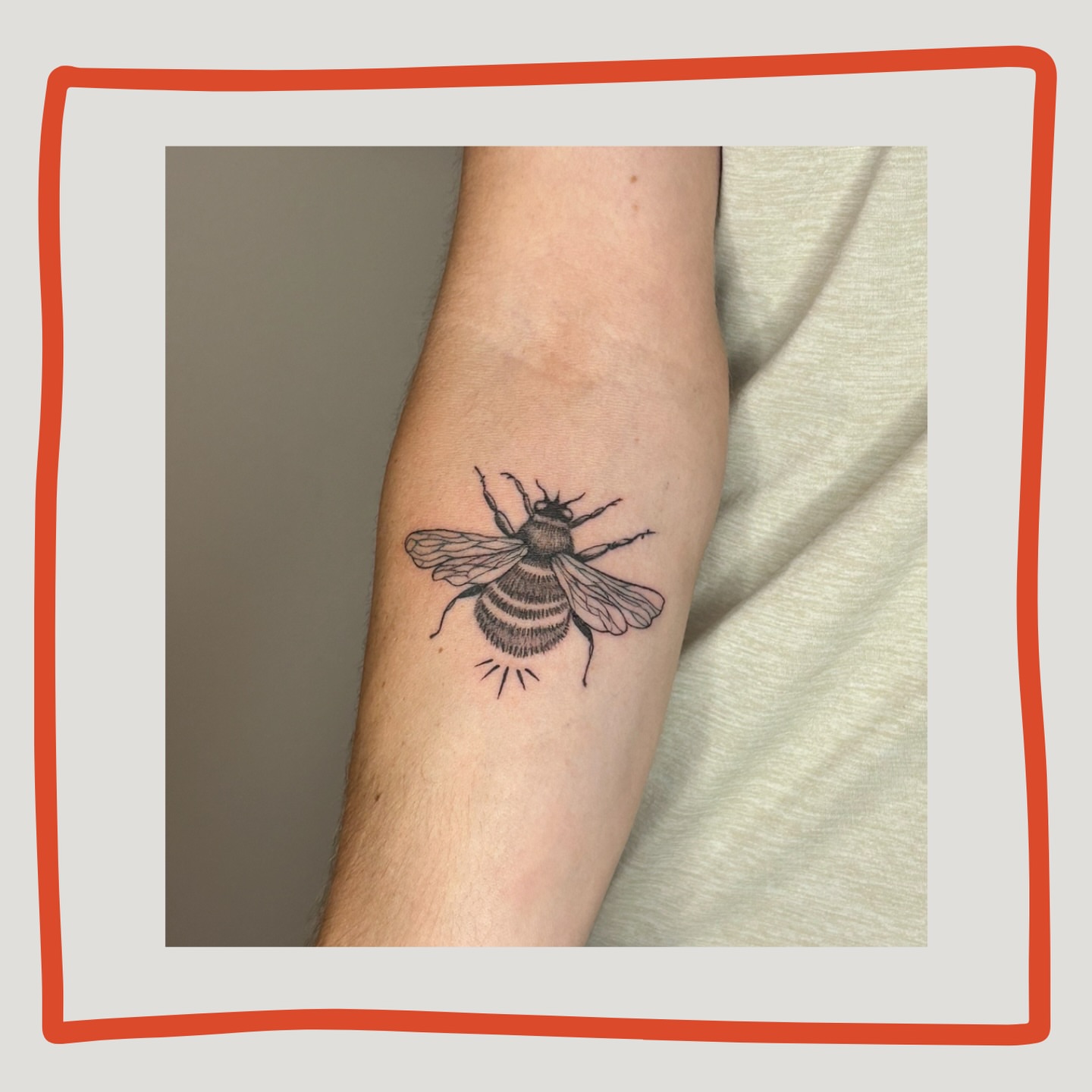 Bee black and grey tattoo on the forearm by Sarah
