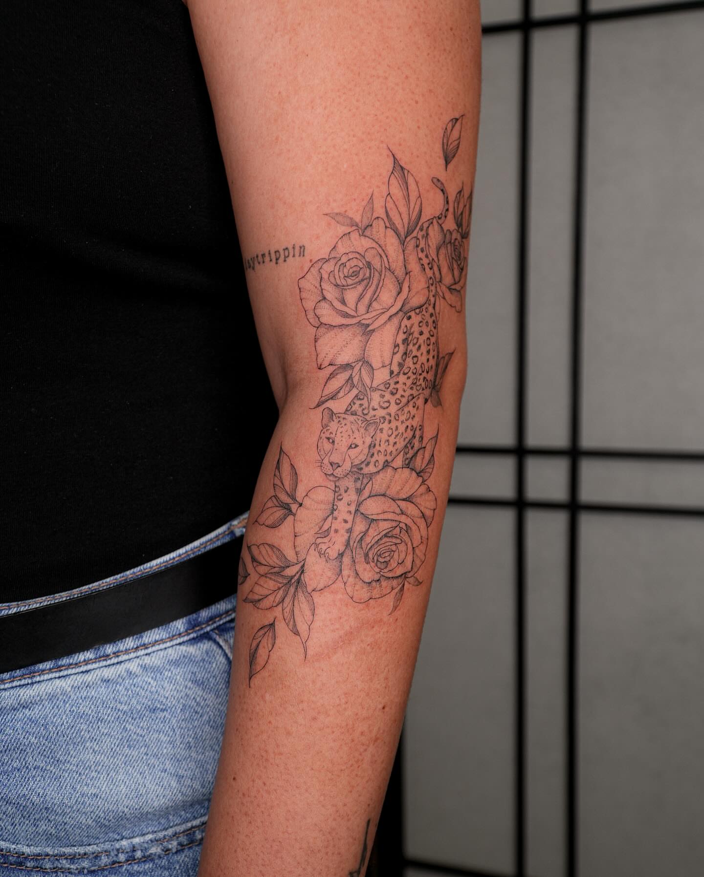 Leopard and roses realism tattoo on the forearm by Pandora ✨ Floral, Los Angeles, California
